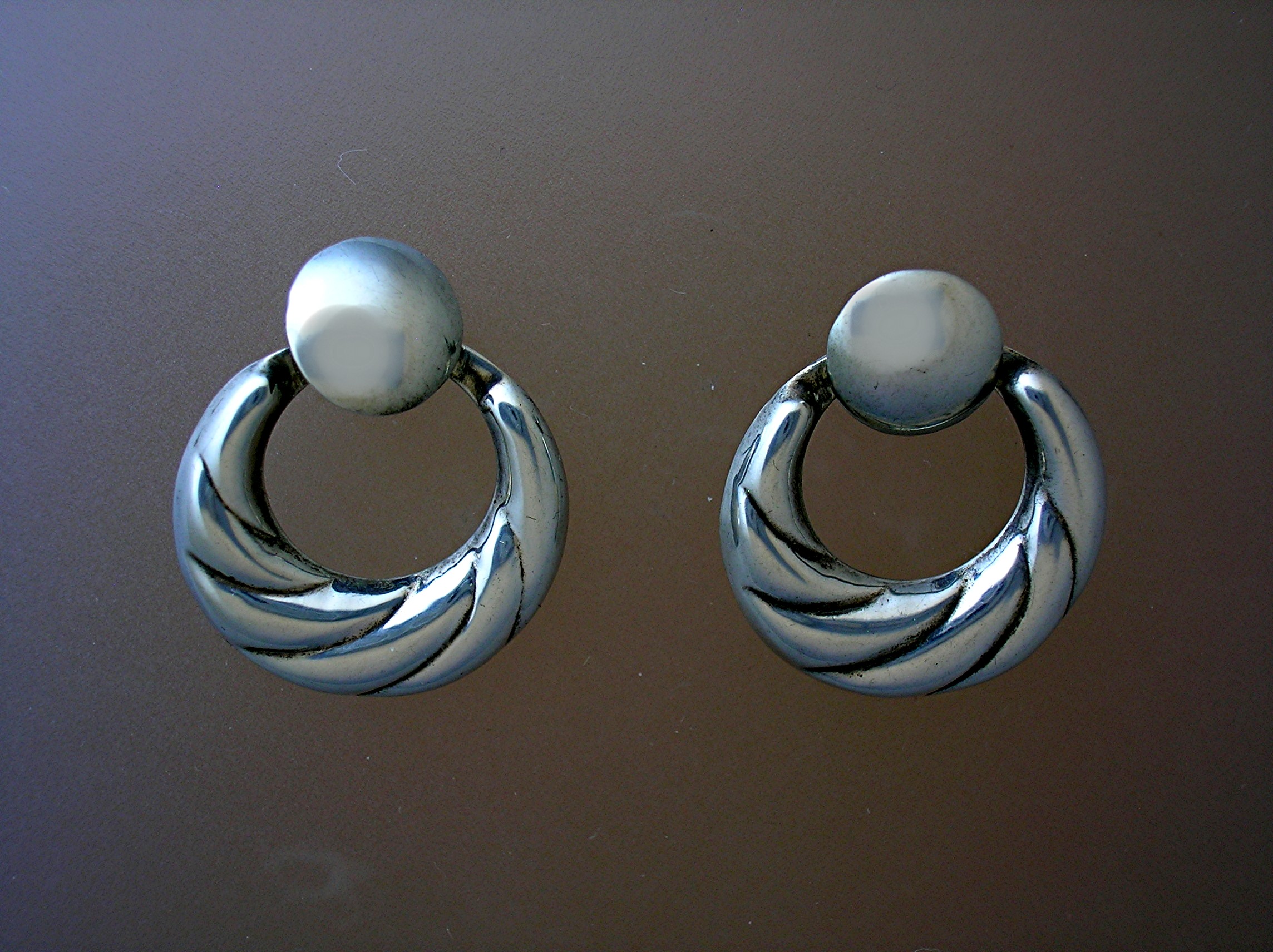 Sterling Silver Pierced Earrings Marked 925.