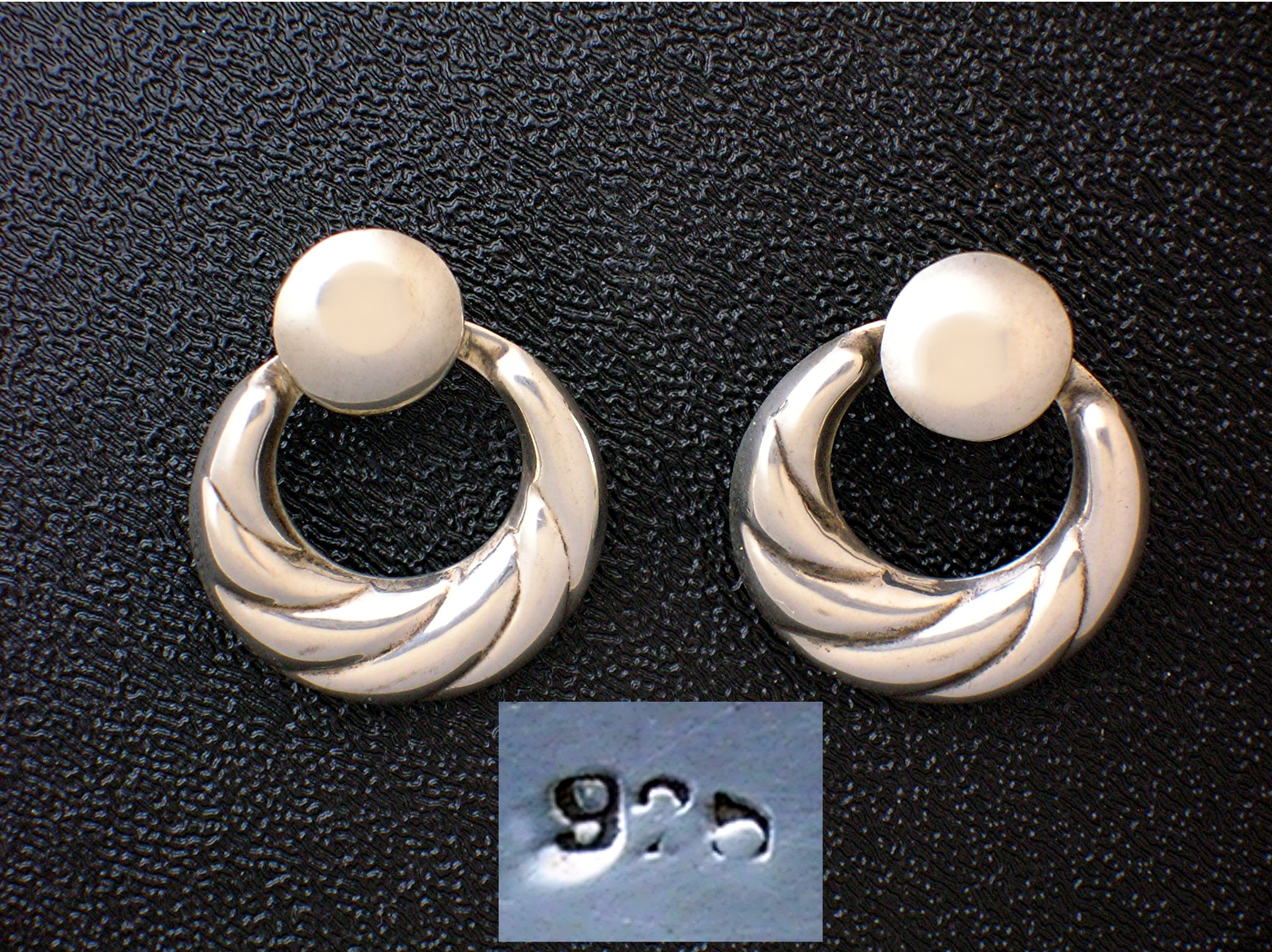 Sterling Silver Pierced Earrings Marked 925.