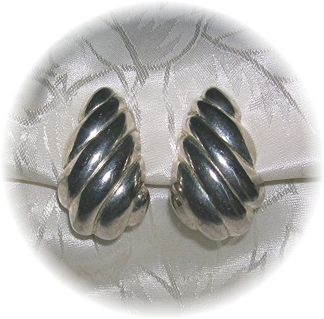 Silvertone Clip Earrings, signed CAROLEE . . . . .