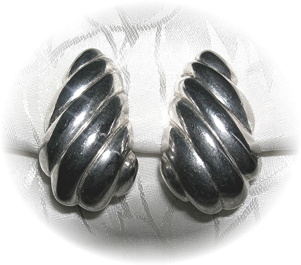 Silvertone Clip Earrings, signed CAROLEE . . . . .