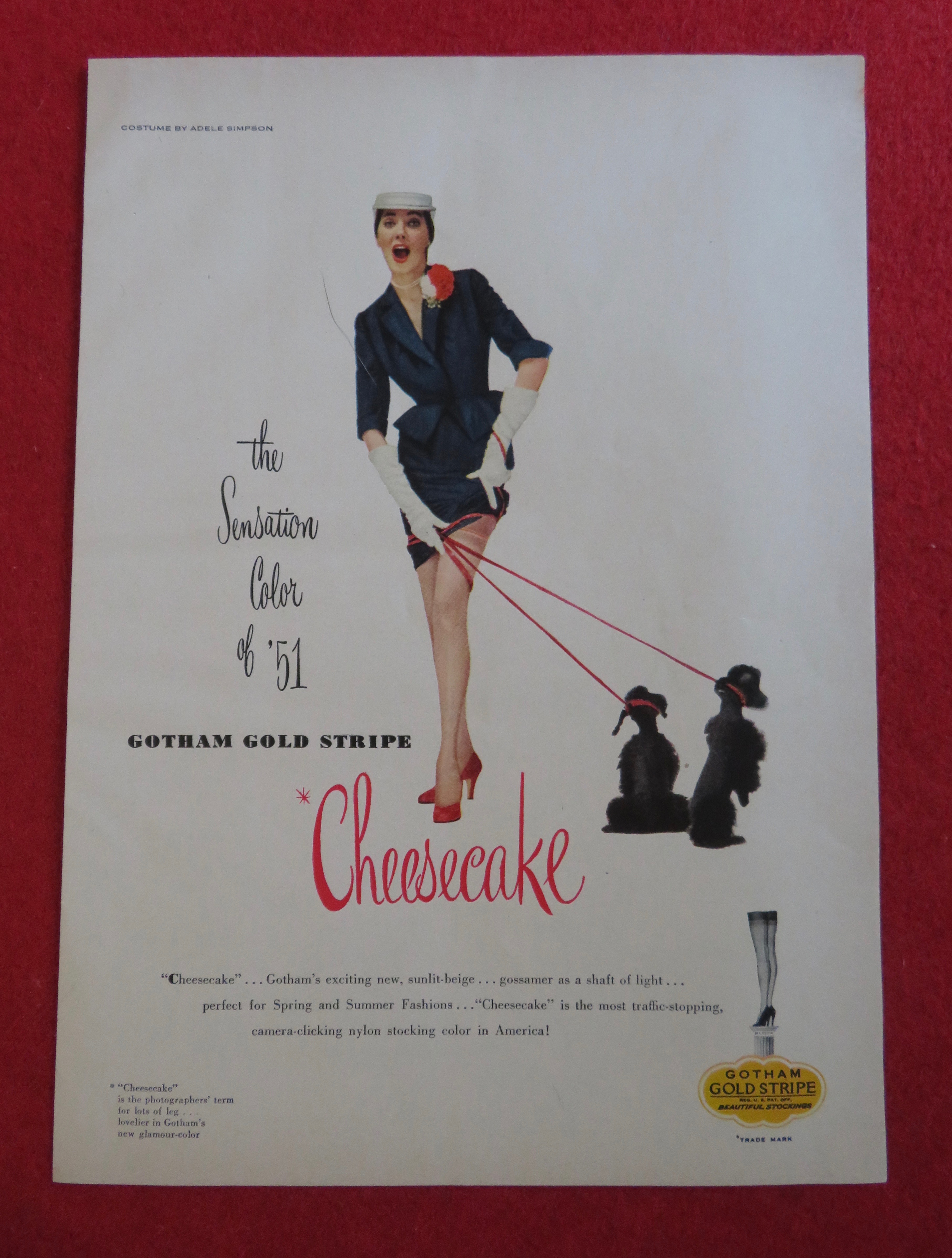 1951 Gotham Gold Stripe Cheesecake w/ Woman In Dress