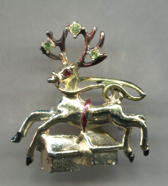 Reindeer Flying Over Houses Pin