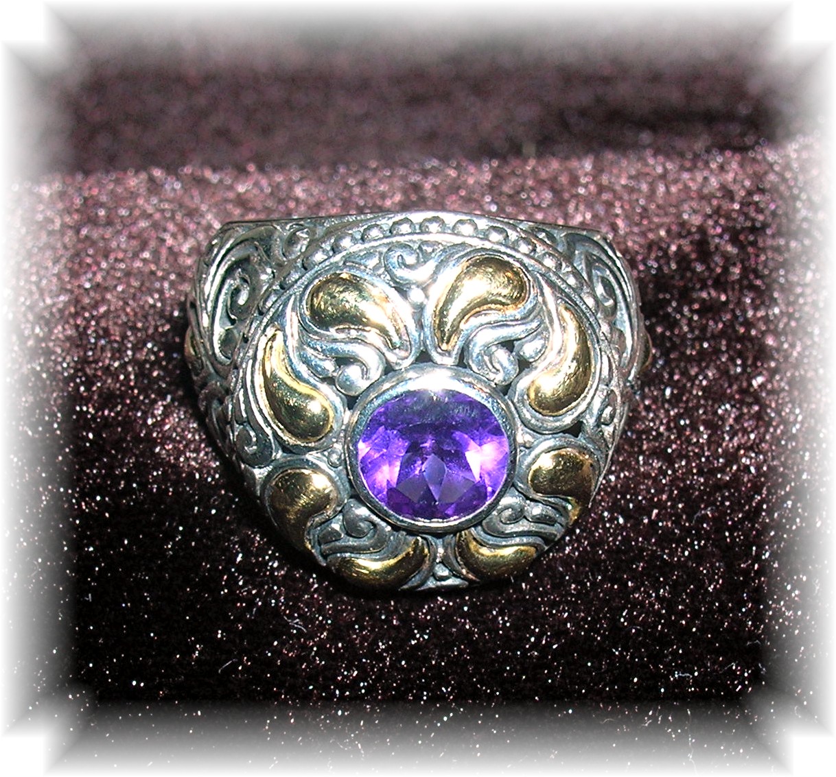 18 K GOLD and STERLING SILVER AMETHYST RING..