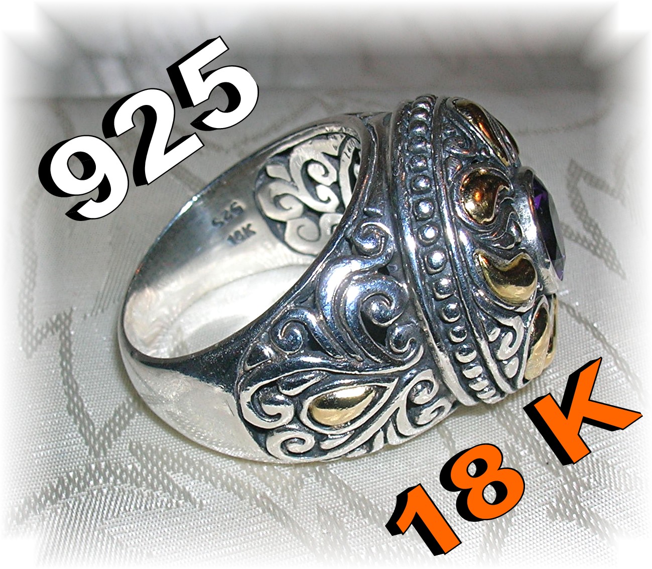 18 K GOLD and STERLING SILVER AMETHYST RING..