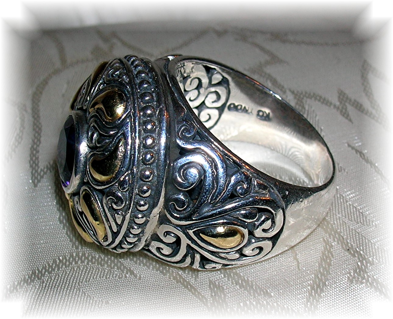 18 K GOLD and STERLING SILVER AMETHYST RING..