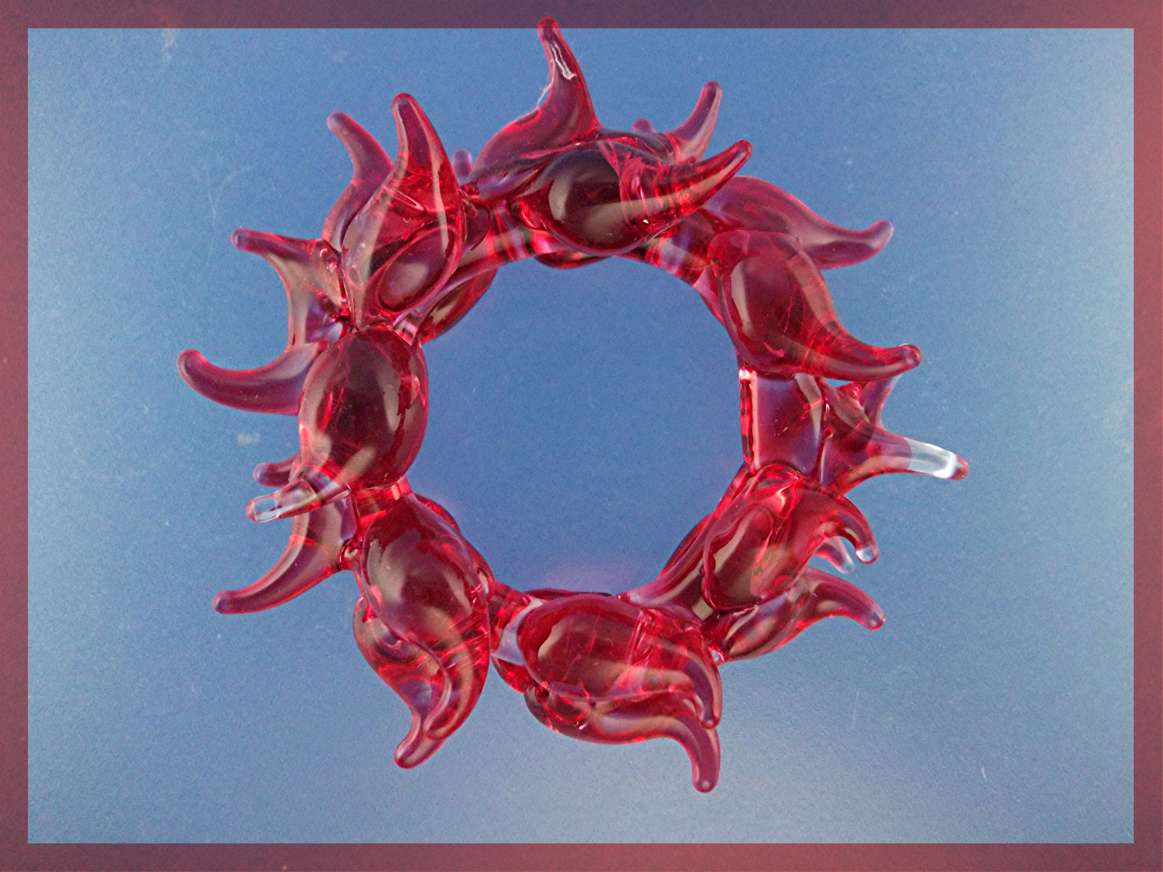Pair of hand blown chili pepper ornaments