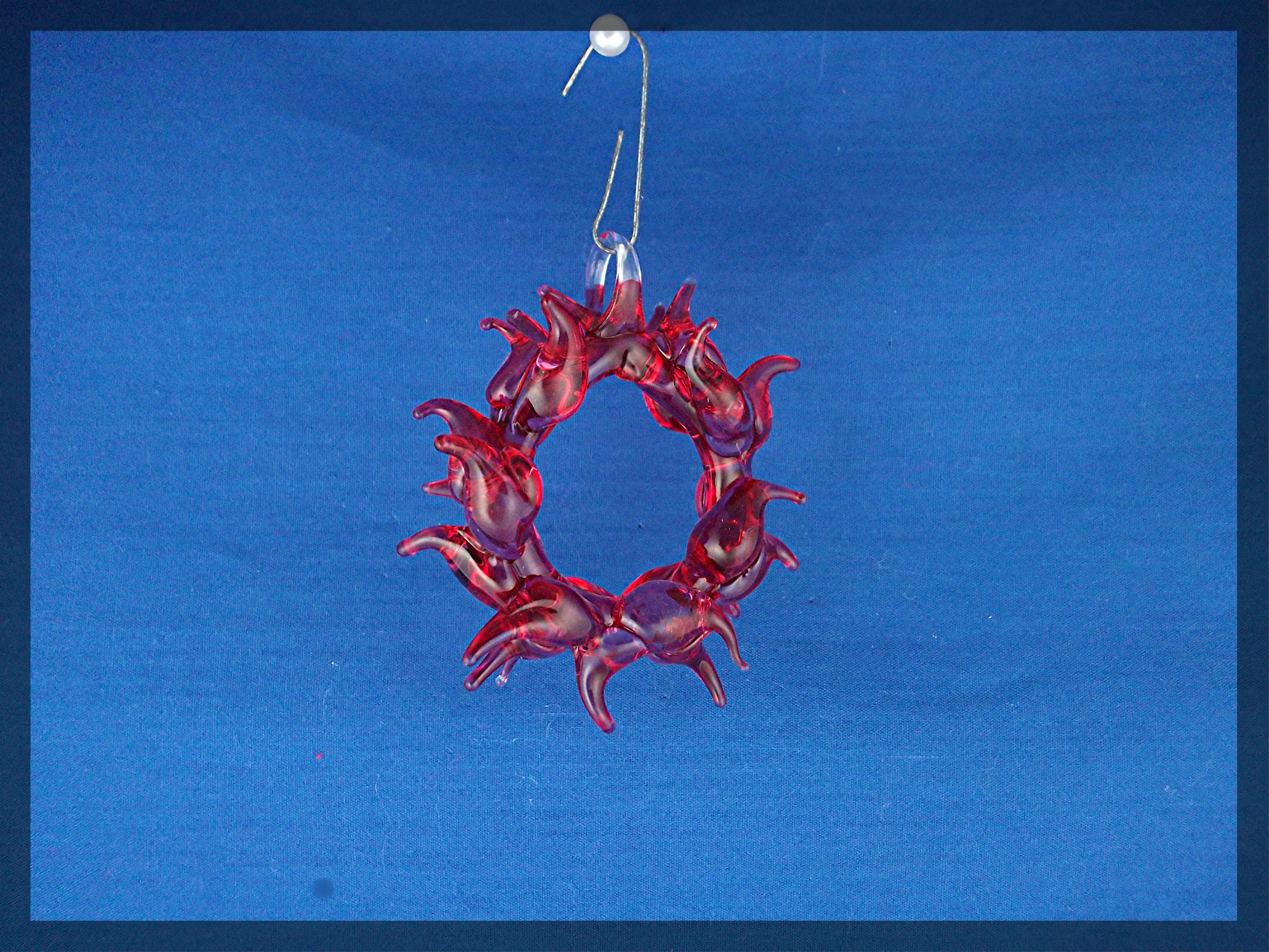 Pair of hand blown chili pepper ornaments