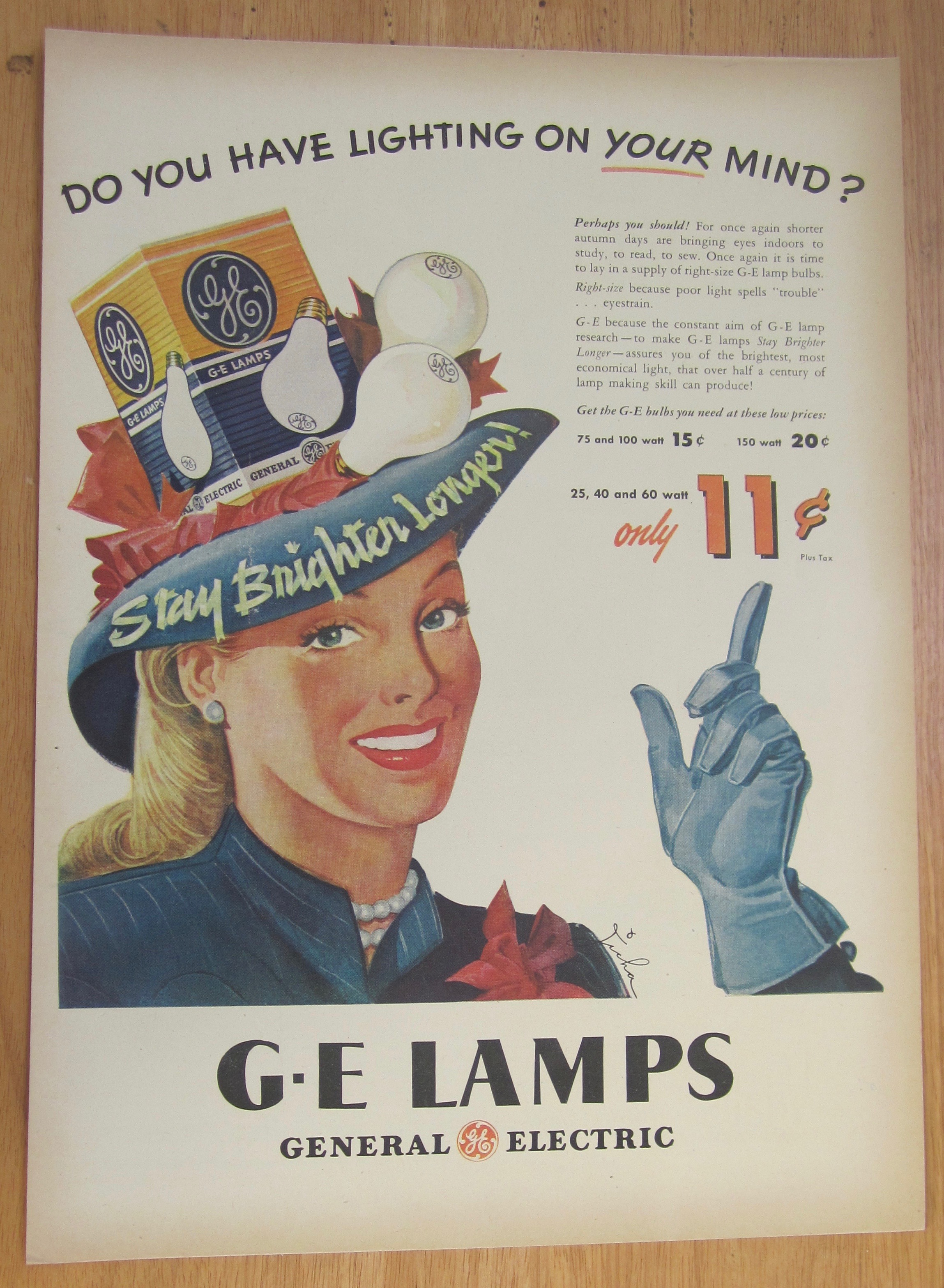 1946 General Electric Lamps with Woman Wearing Bulb Hat