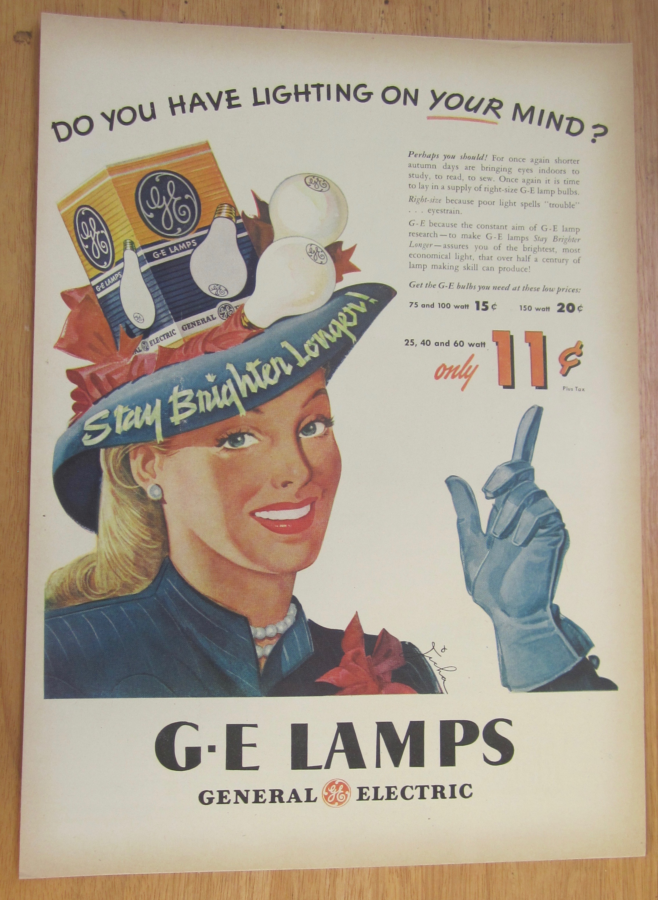 1946 General Electric Lamps with Woman Wearing Bulb Hat