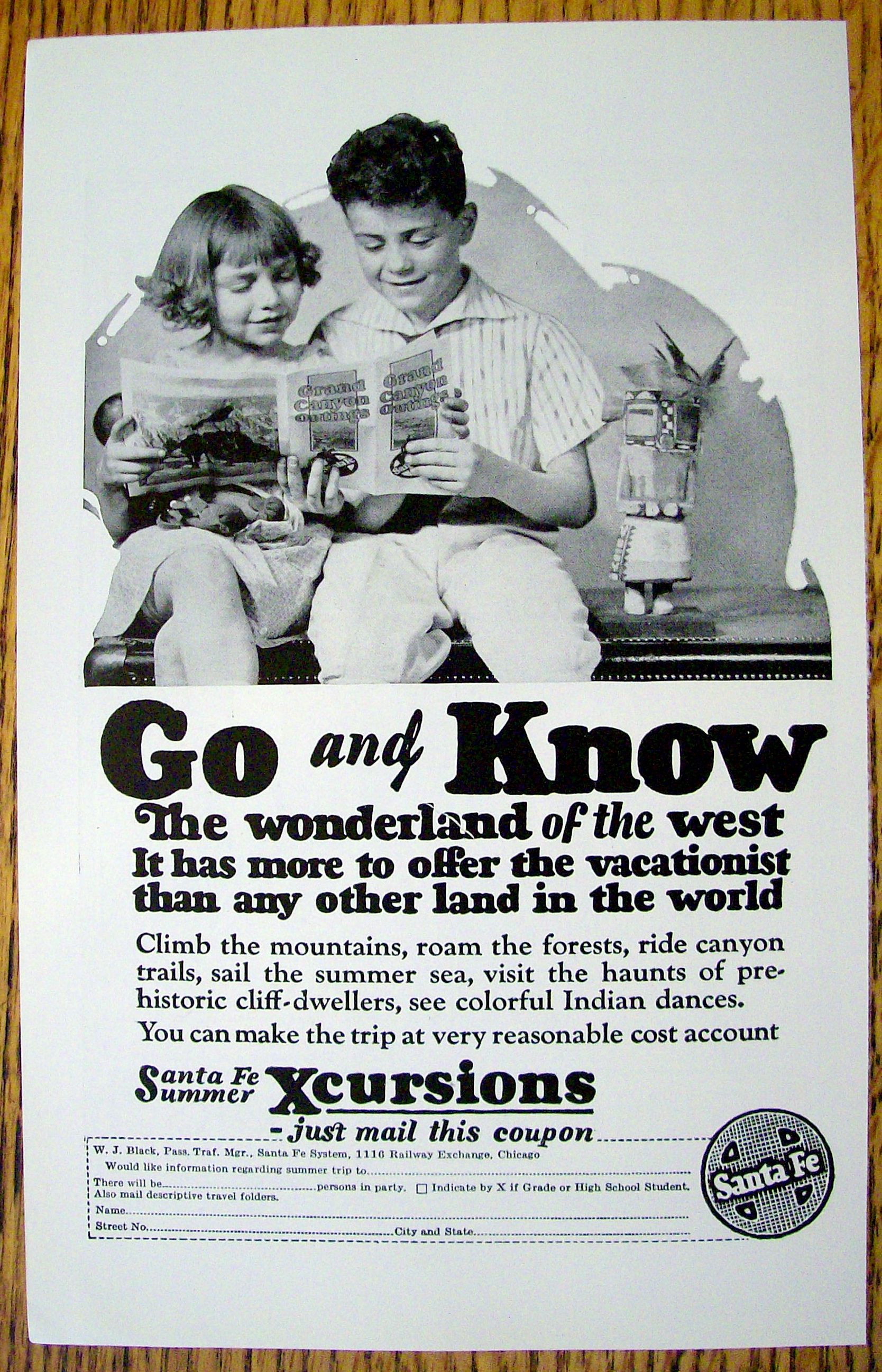 1926 Santa Fe (Summer Xcursions) with Boy & Girl Looking At Traveling Booklet