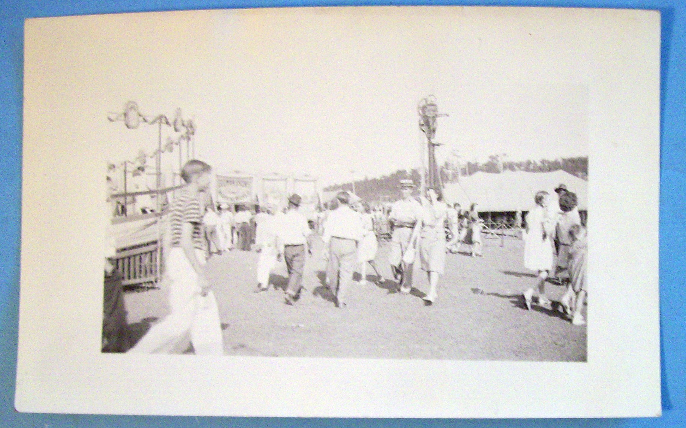Photograph Of Carnival Scene with Assortment of Rides