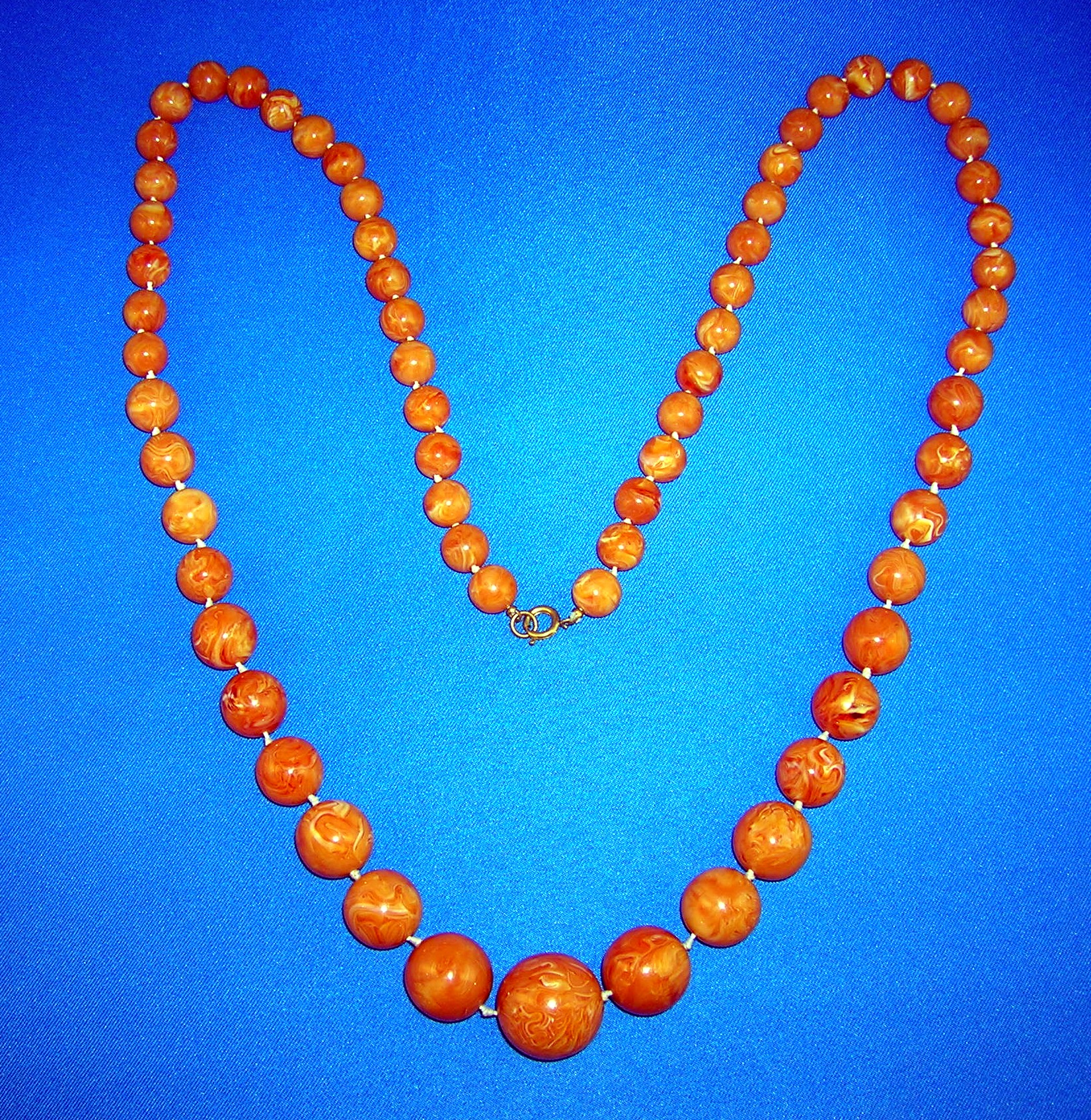 39 Inch Long Graduated Plastic/Lucite Beads