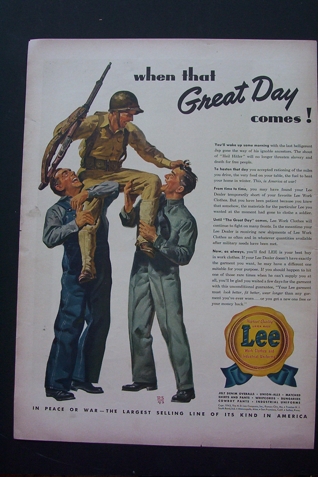 1943 Lee Work Clothes with 2 Men Holding Up Soldier