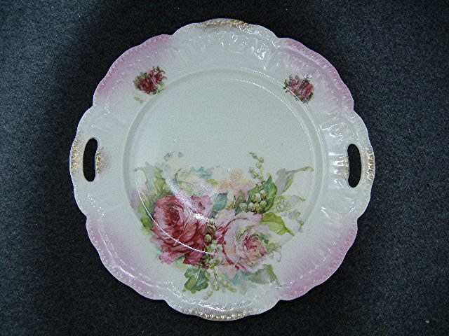 China Floral serving plate handles and gold highlites