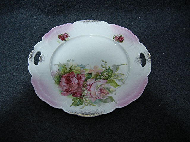 China  Floral serving plate handles and gold highlites