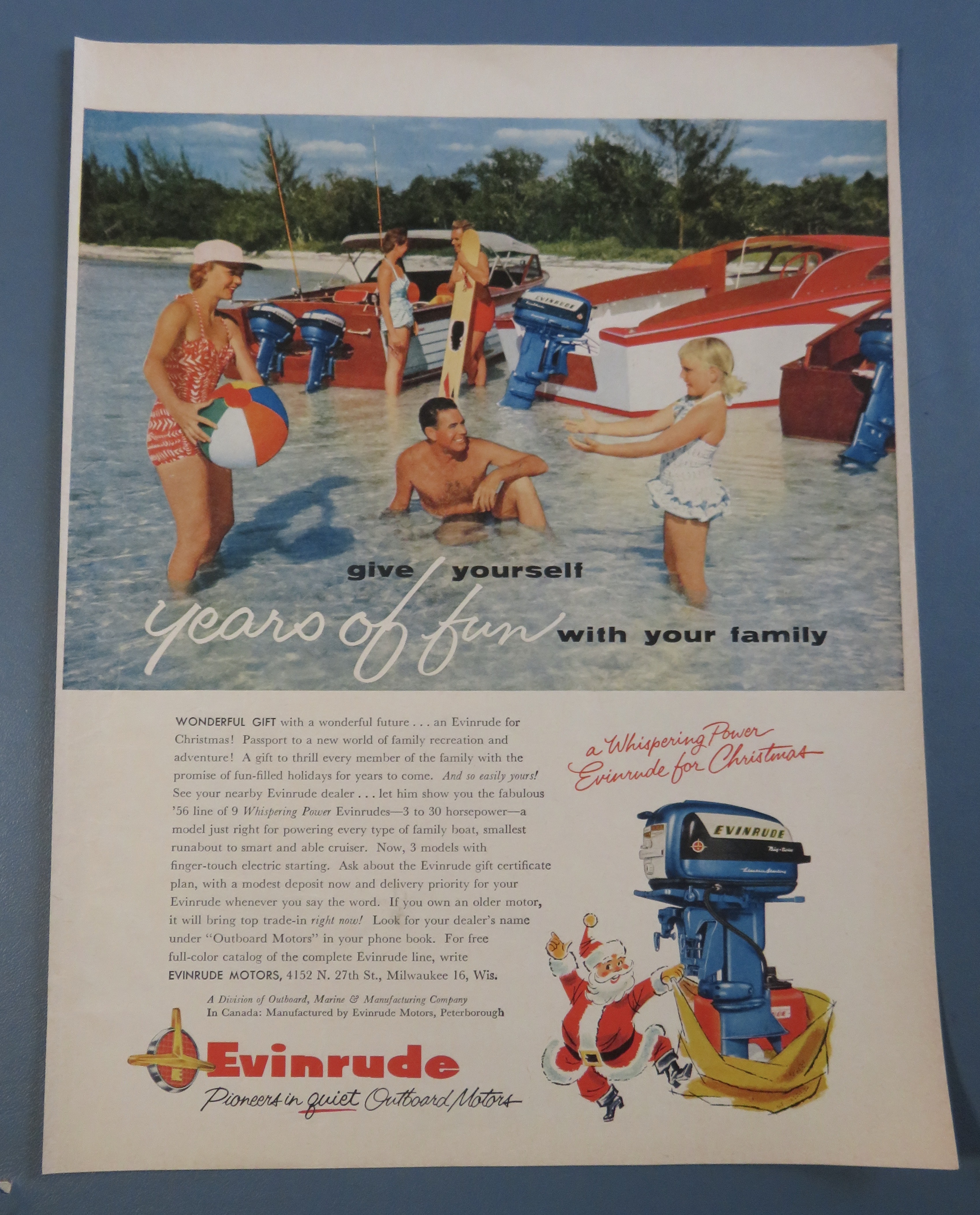 1955 Evinrude Outboard Motors with Family Playing