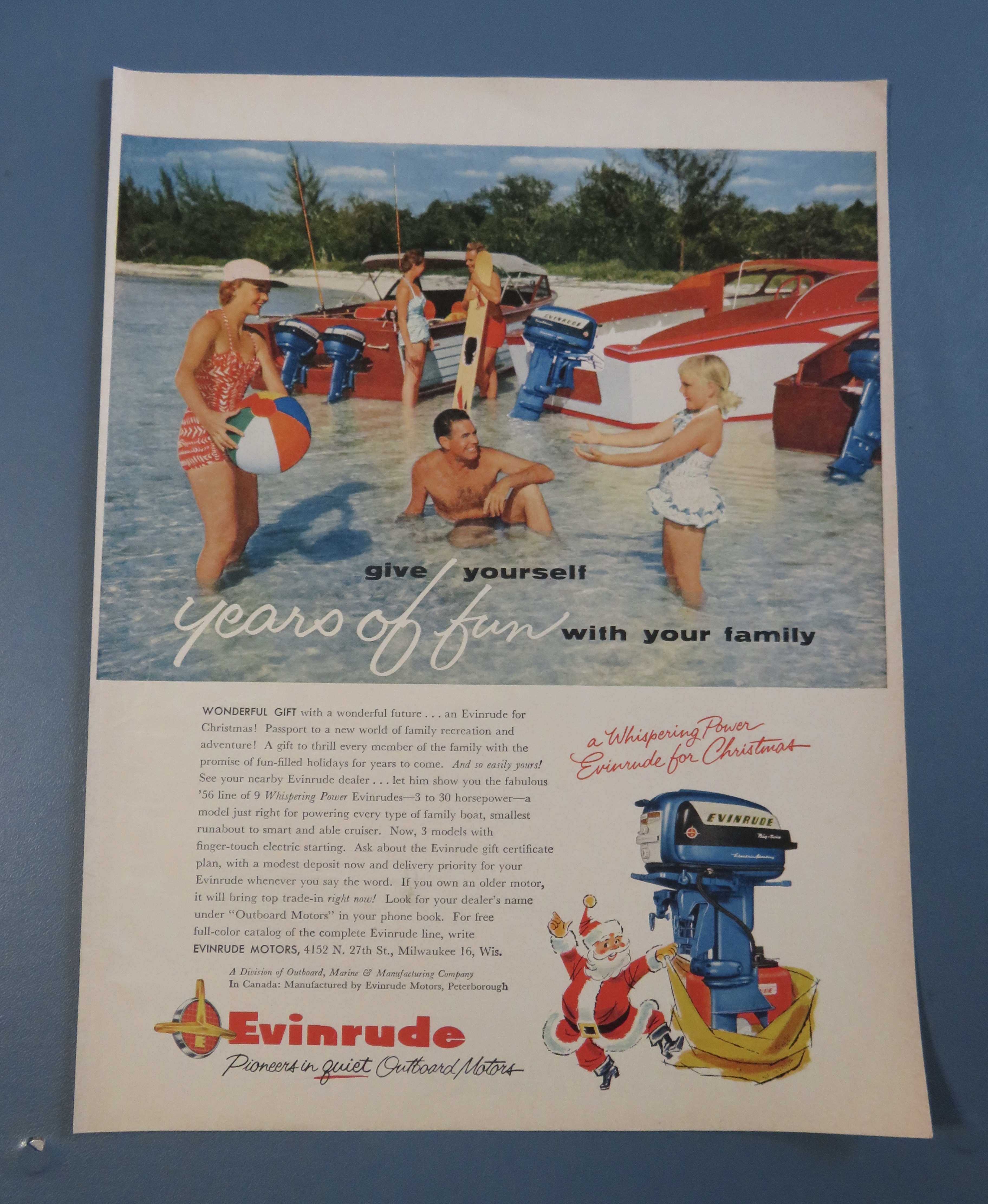 1955 Evinrude Outboard Motors with Family Playing