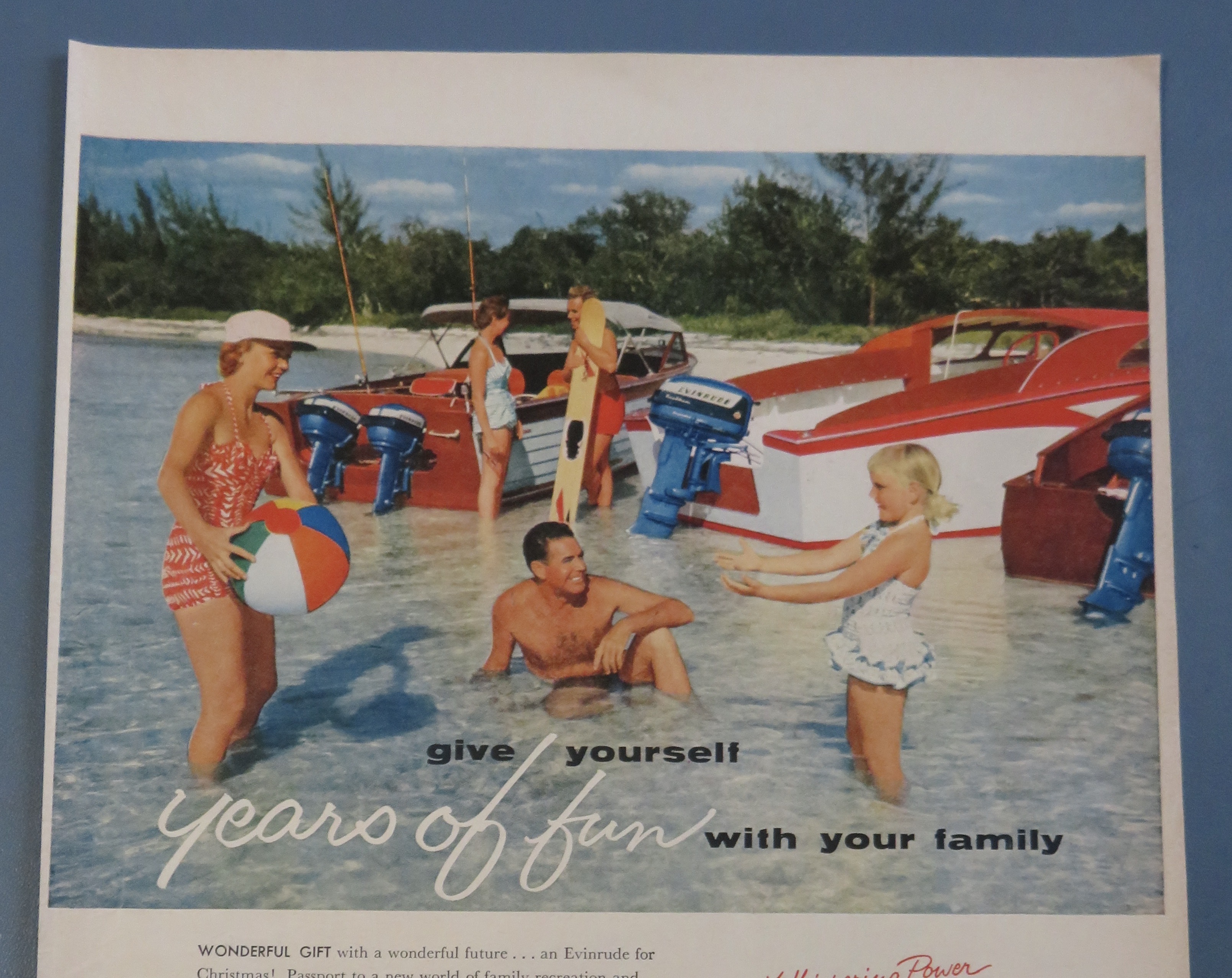 1955 Evinrude Outboard Motors with Family Playing