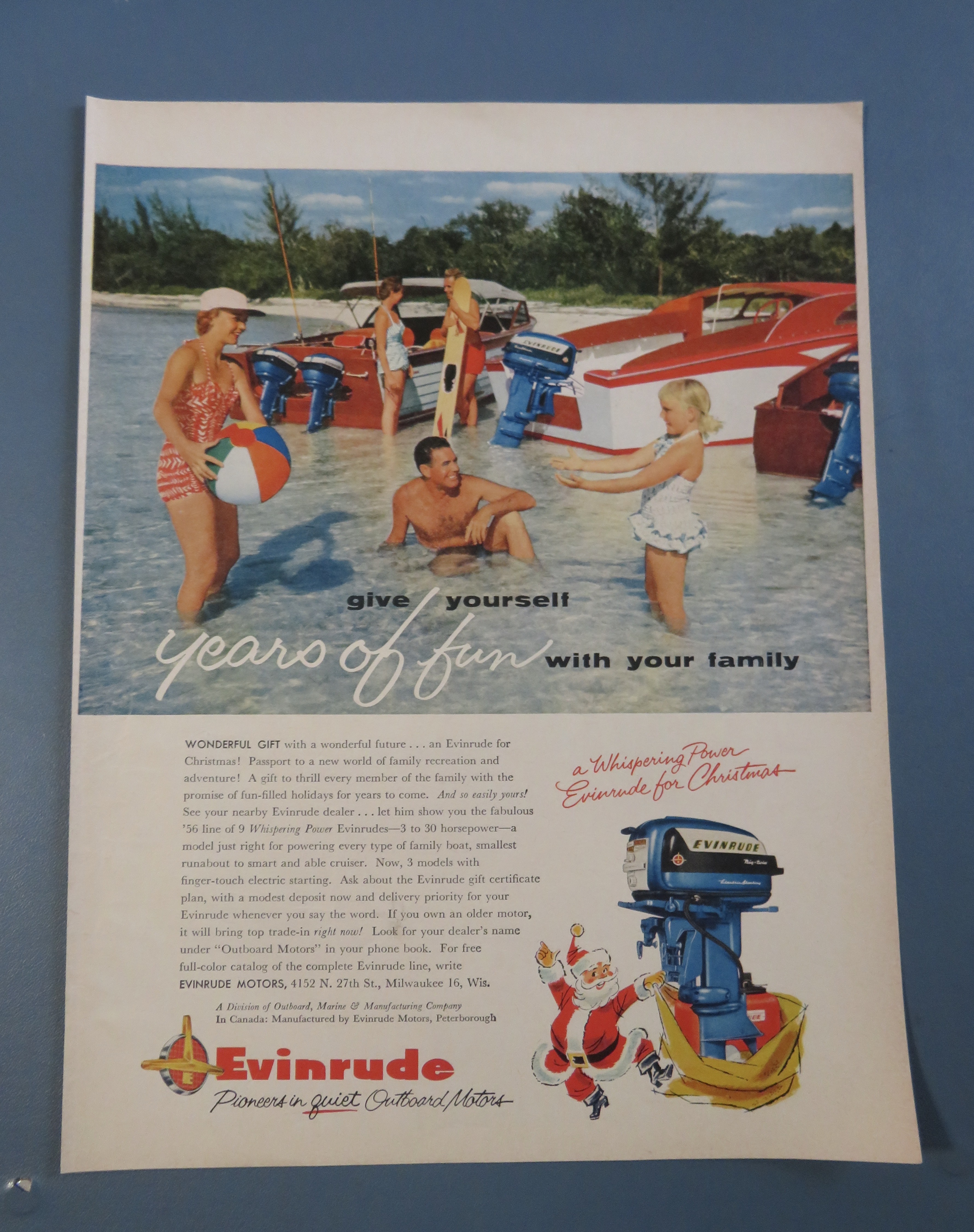 1955 Evinrude Outboard Motors with Family Playing