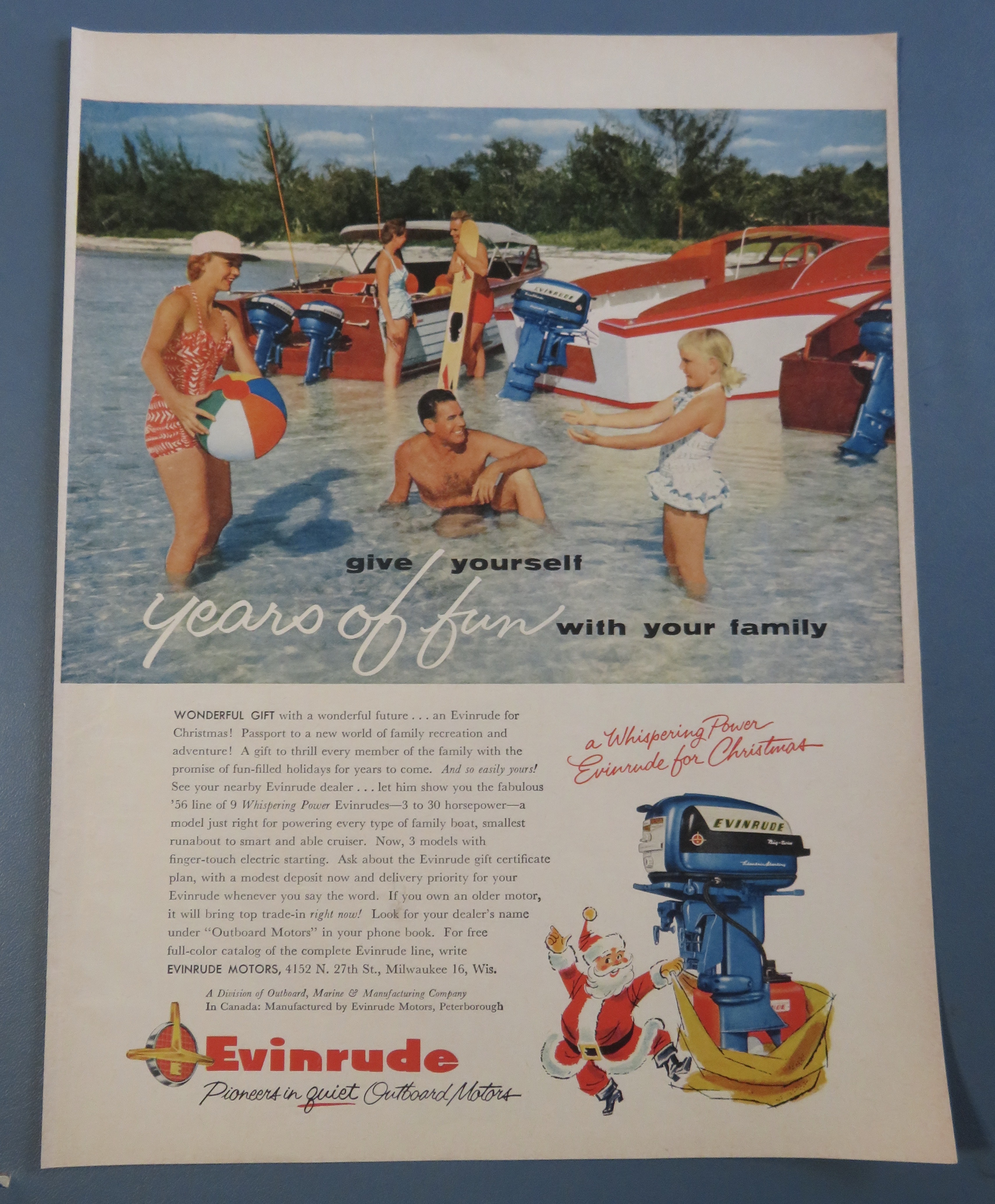 1955 Evinrude Outboard Motors with Family Playing