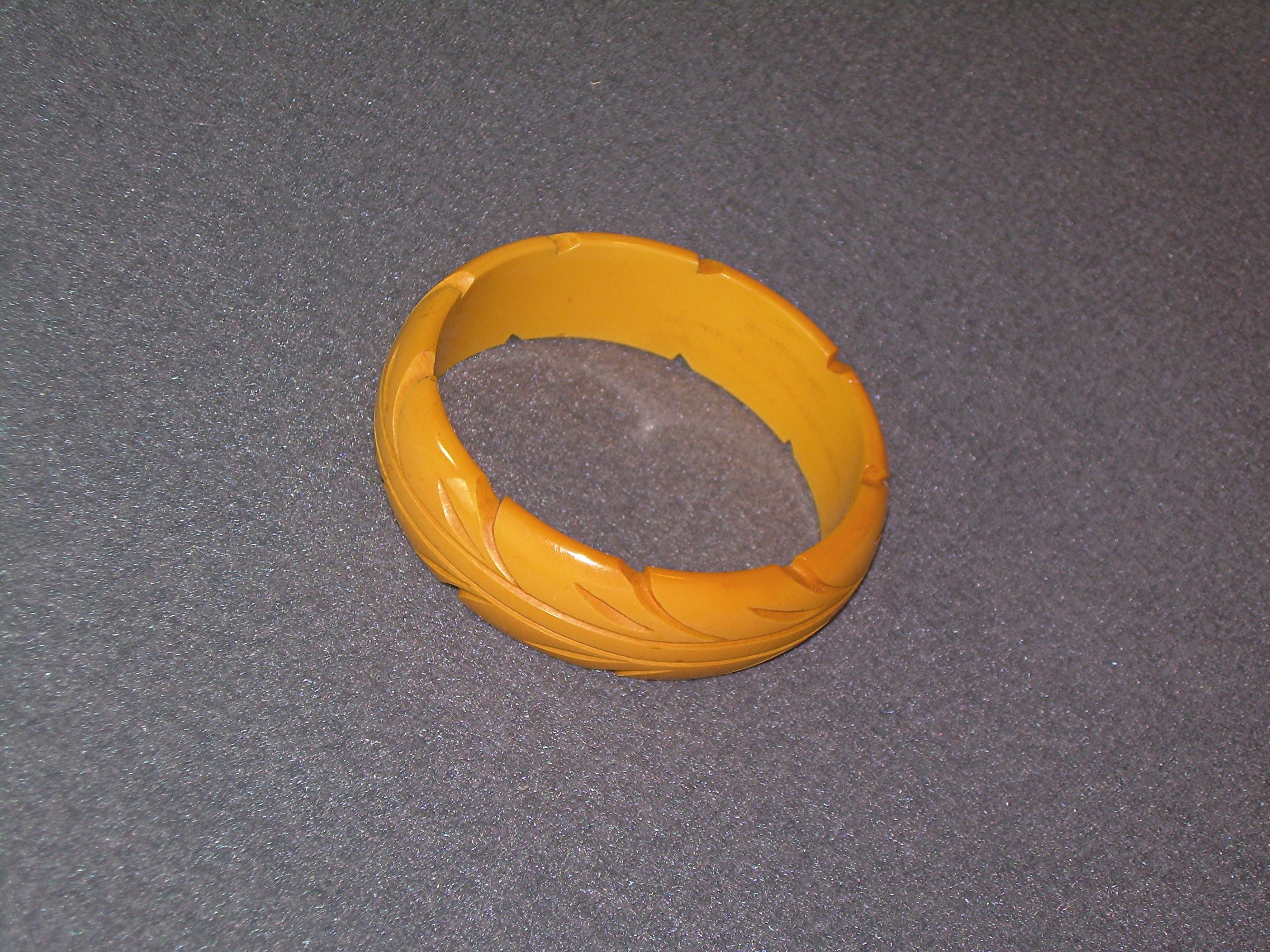 Bakelite Gold Carved Bangle Bracelet