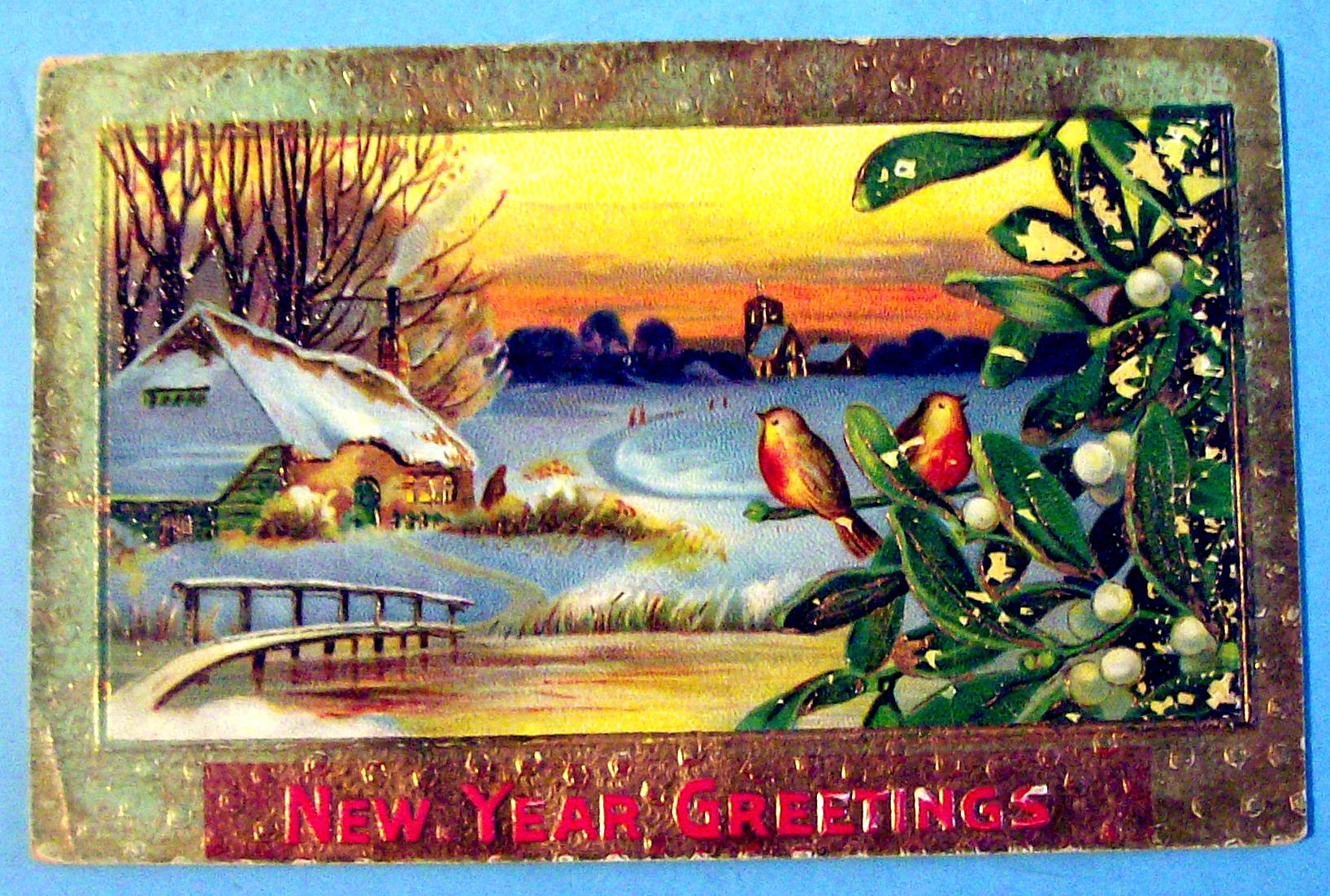 New Year Greetings Postcard with Town Covered in Snow