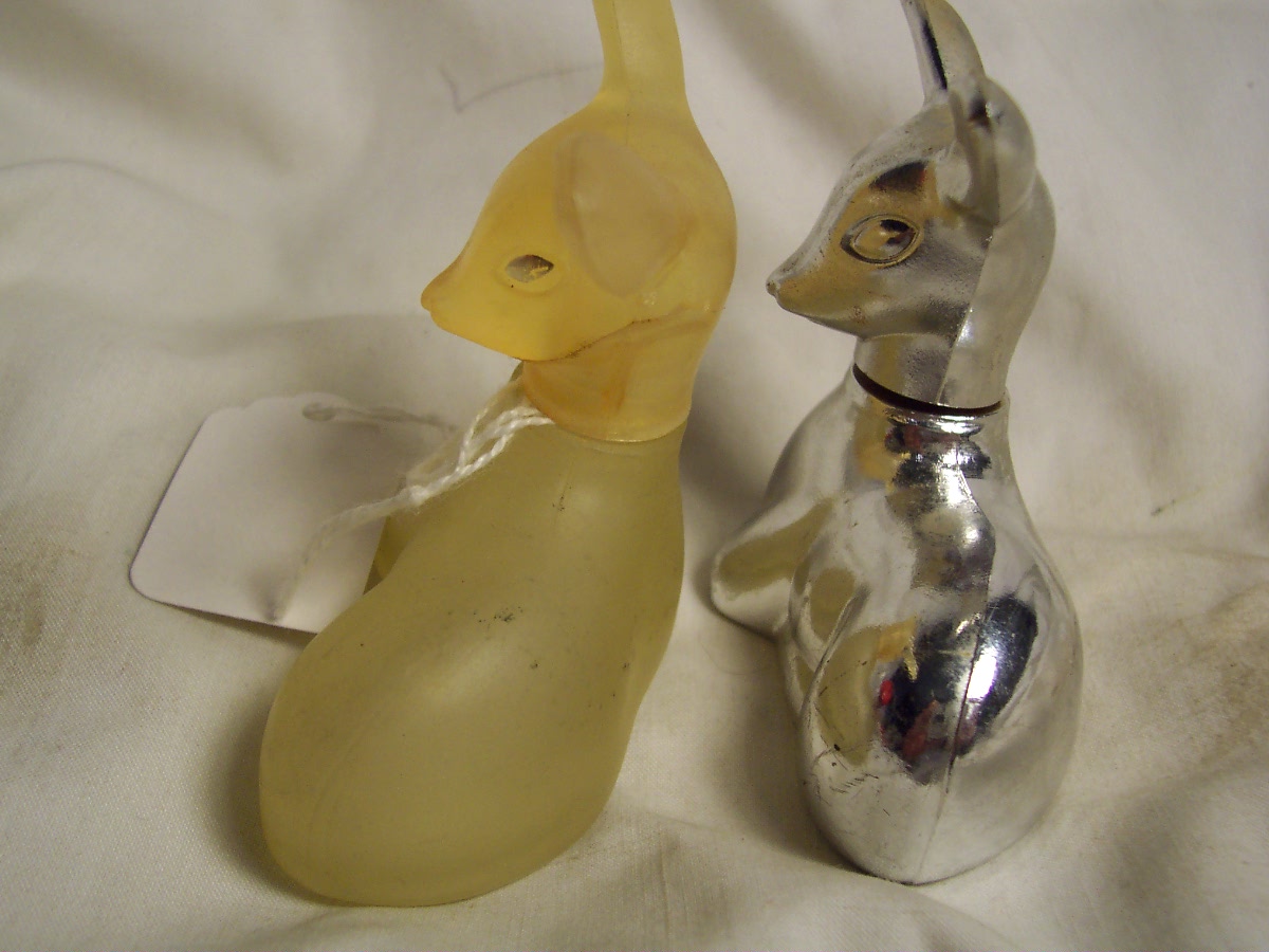 Avon Bottles Precious Doe and Silver Fawn