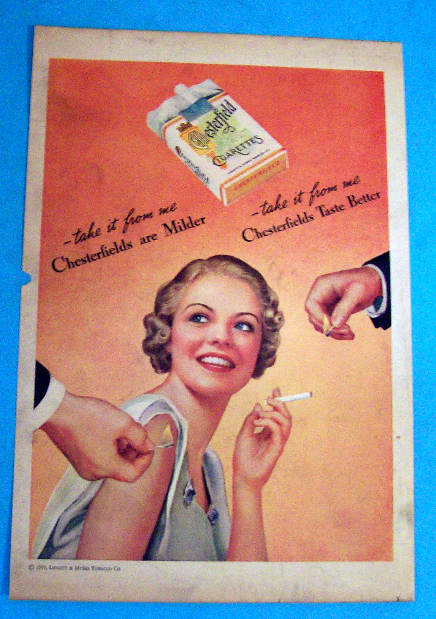 1935 Chesterfield Cigarettes w/Woman Getting Light