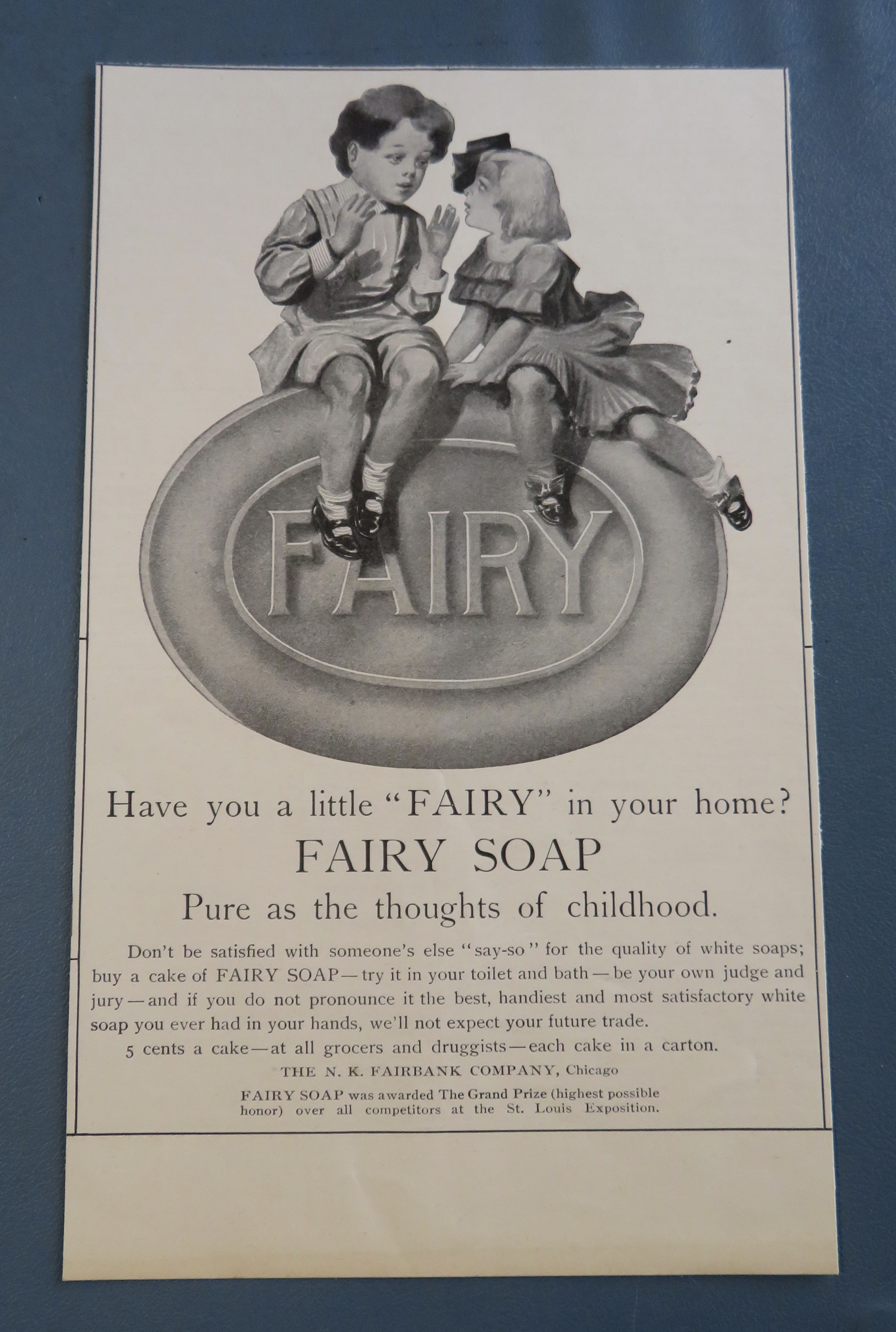 1905 Fairy Soap w/ Boy & Girl Kissing On A Bar Of Soap