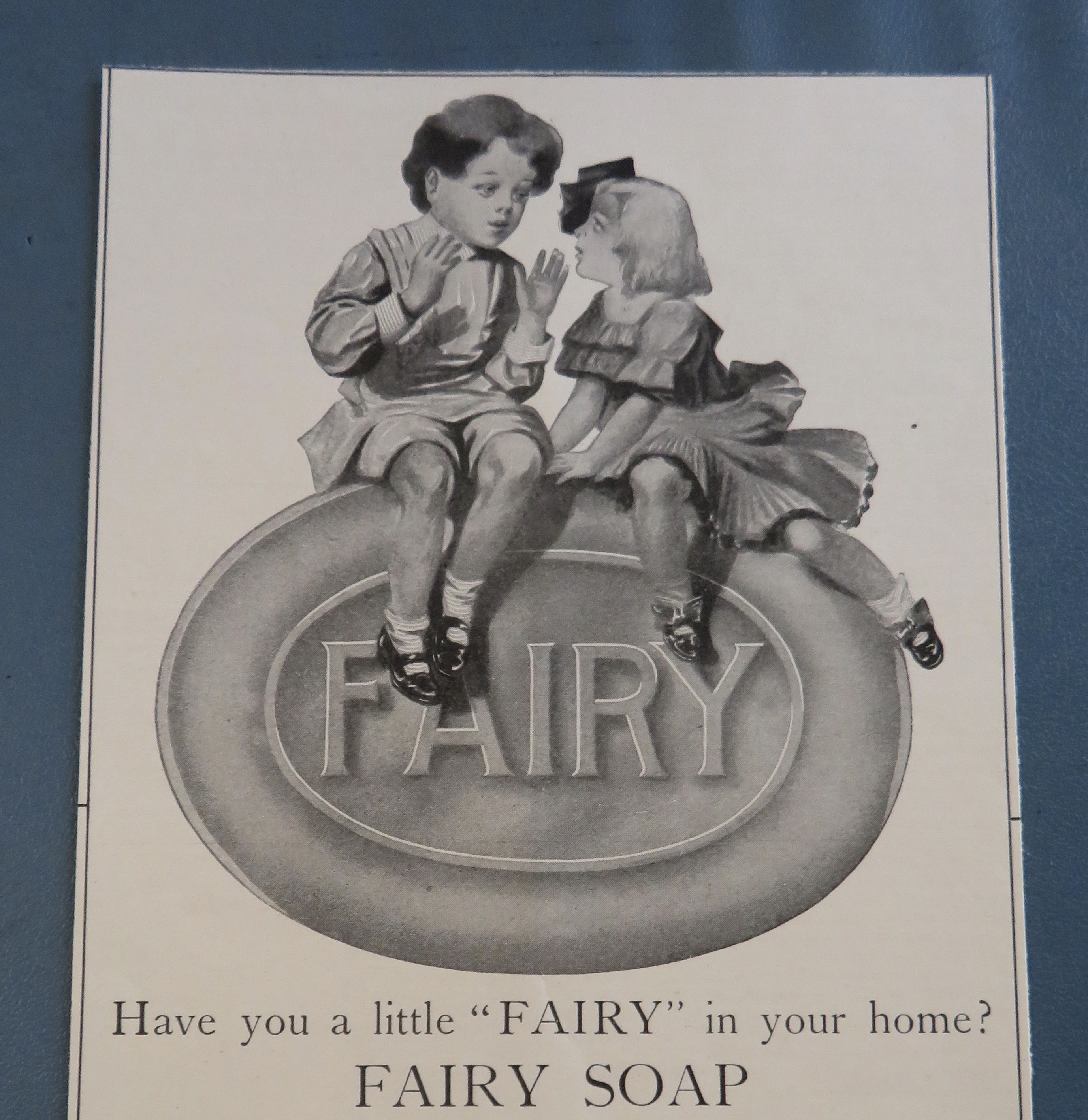 1905 Fairy Soap w/ Boy & Girl Kissing On A Bar Of Soap