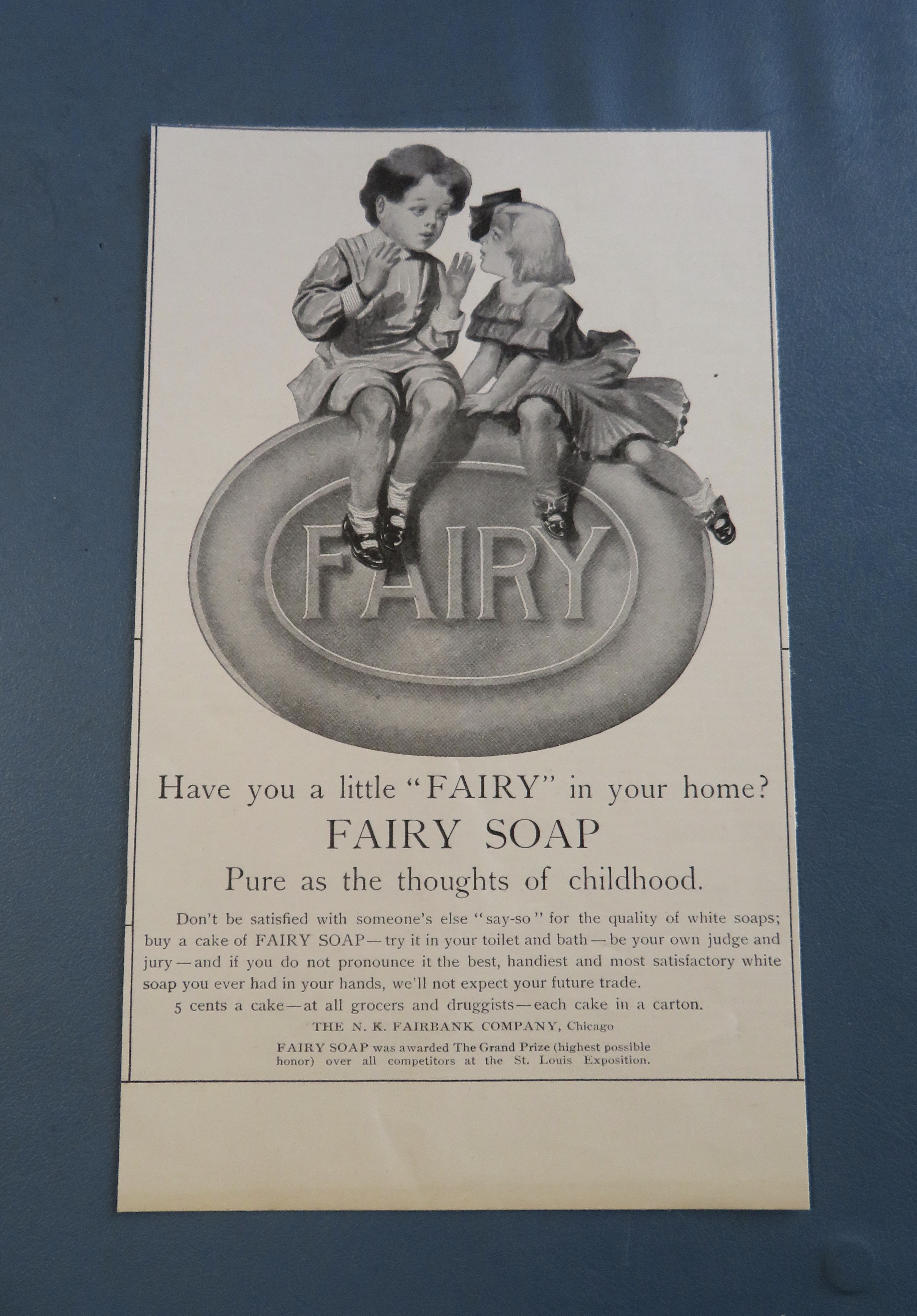1905 Fairy Soap w/ Boy & Girl Kissing On A Bar Of Soap