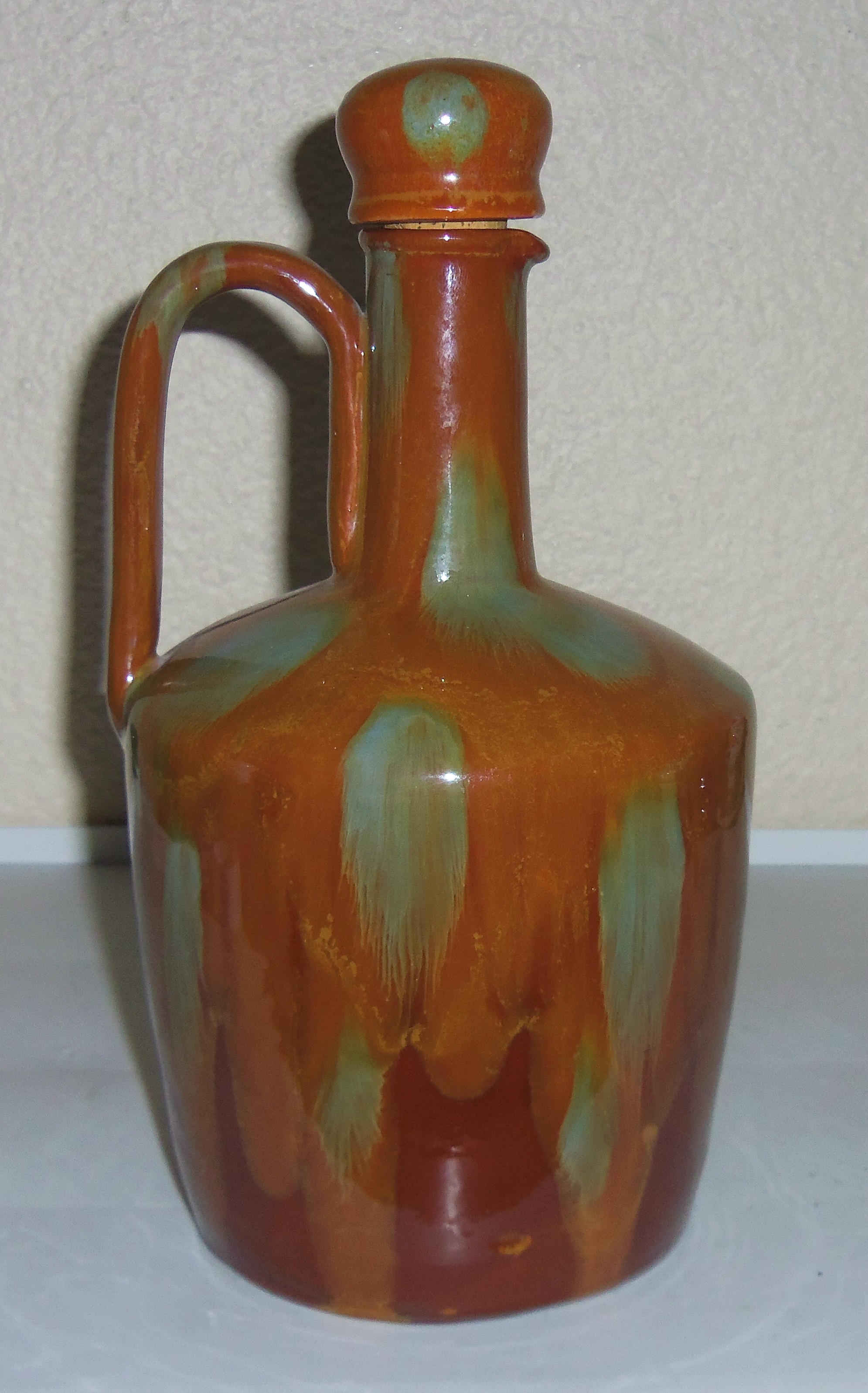 Switzerland Art Pottery Brown Flambe Musical Jug W/Cap!