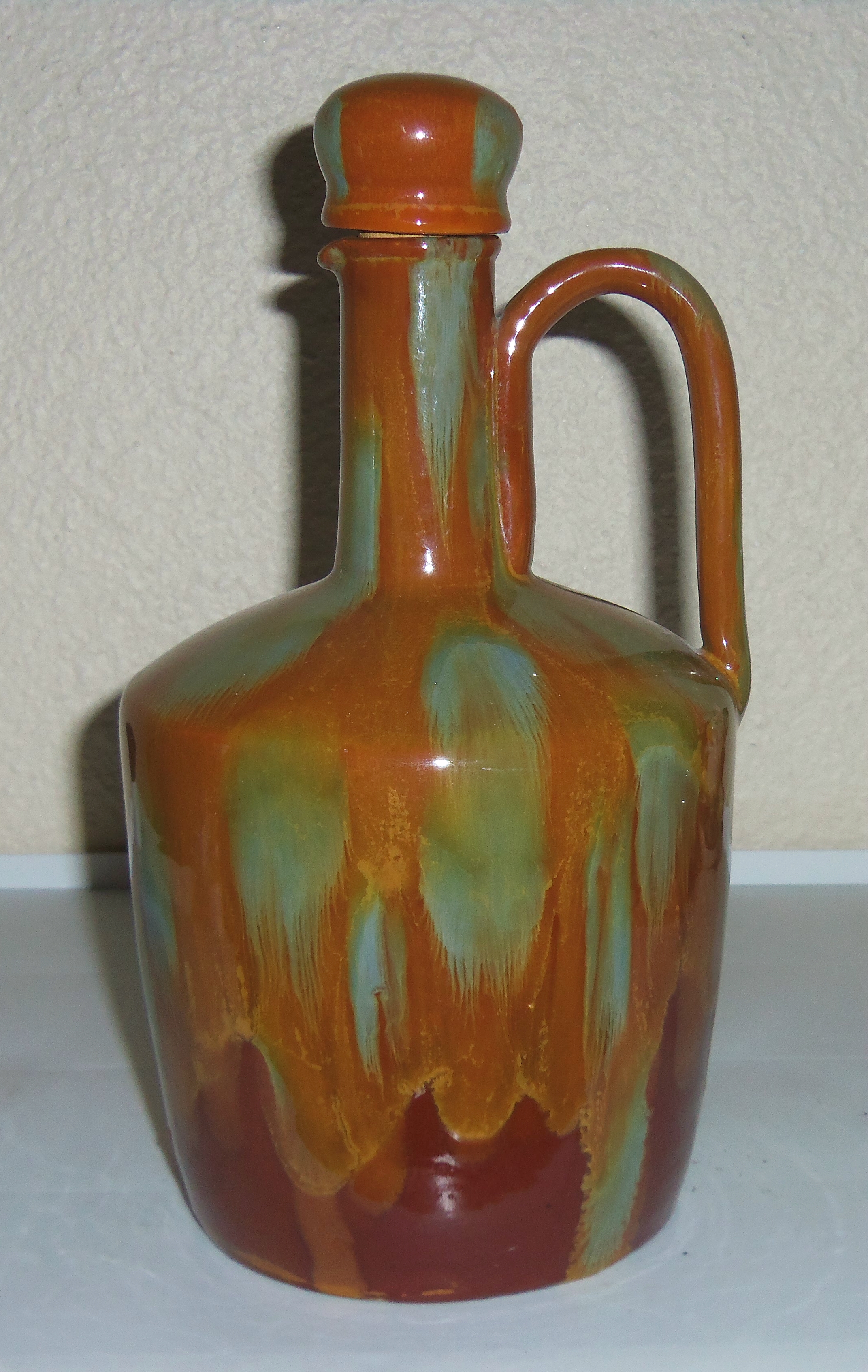Switzerland Art Pottery Brown Flambe Musical Jug W/Cap!