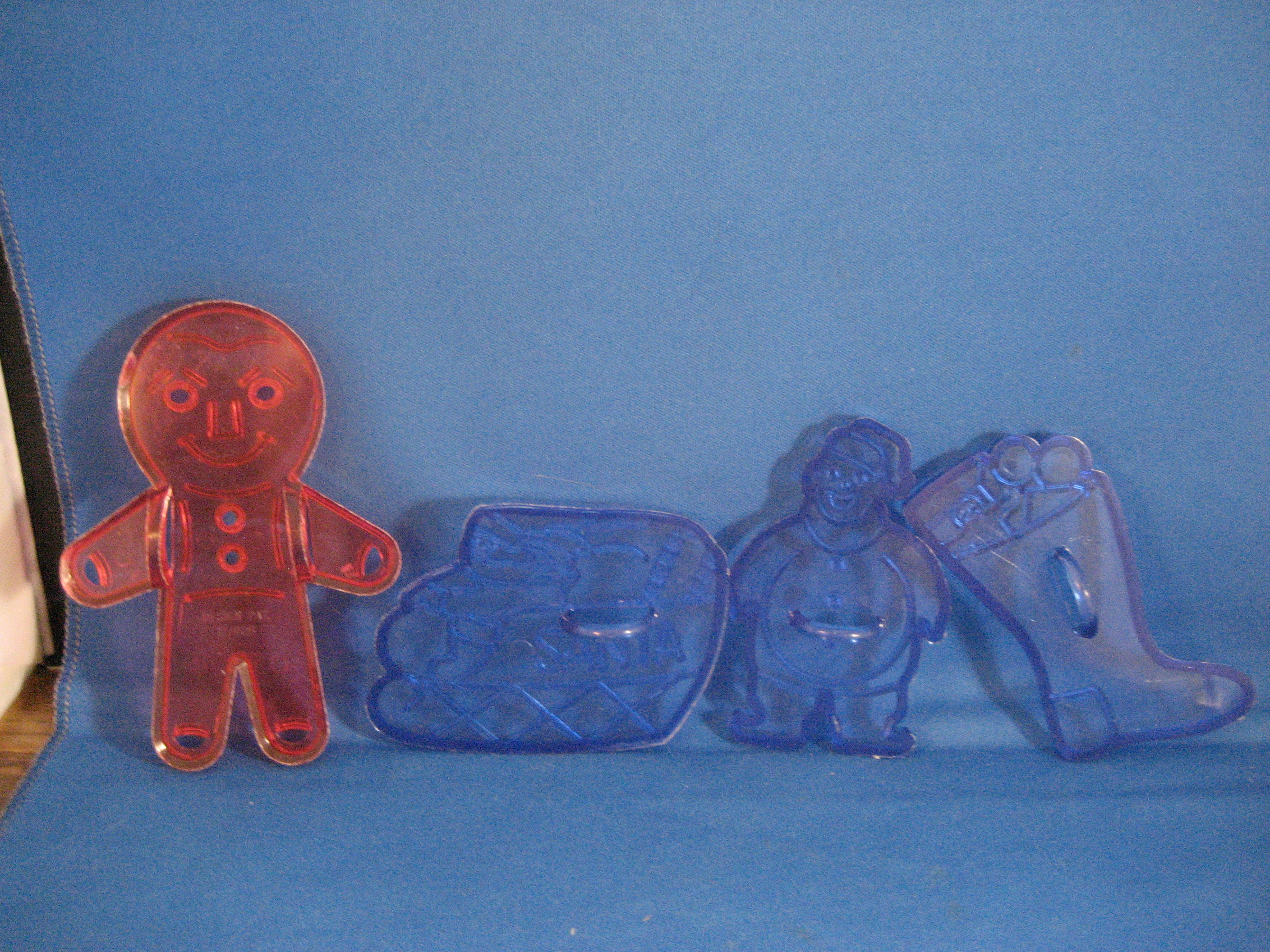 Four Plastic Christmas Cookie Cutters