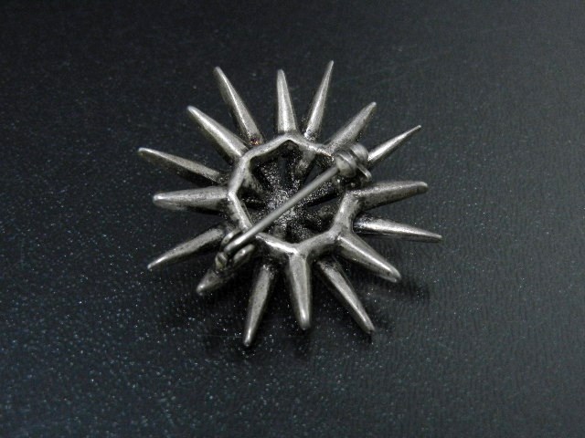 Crystal Silver Tone Starburst Pin