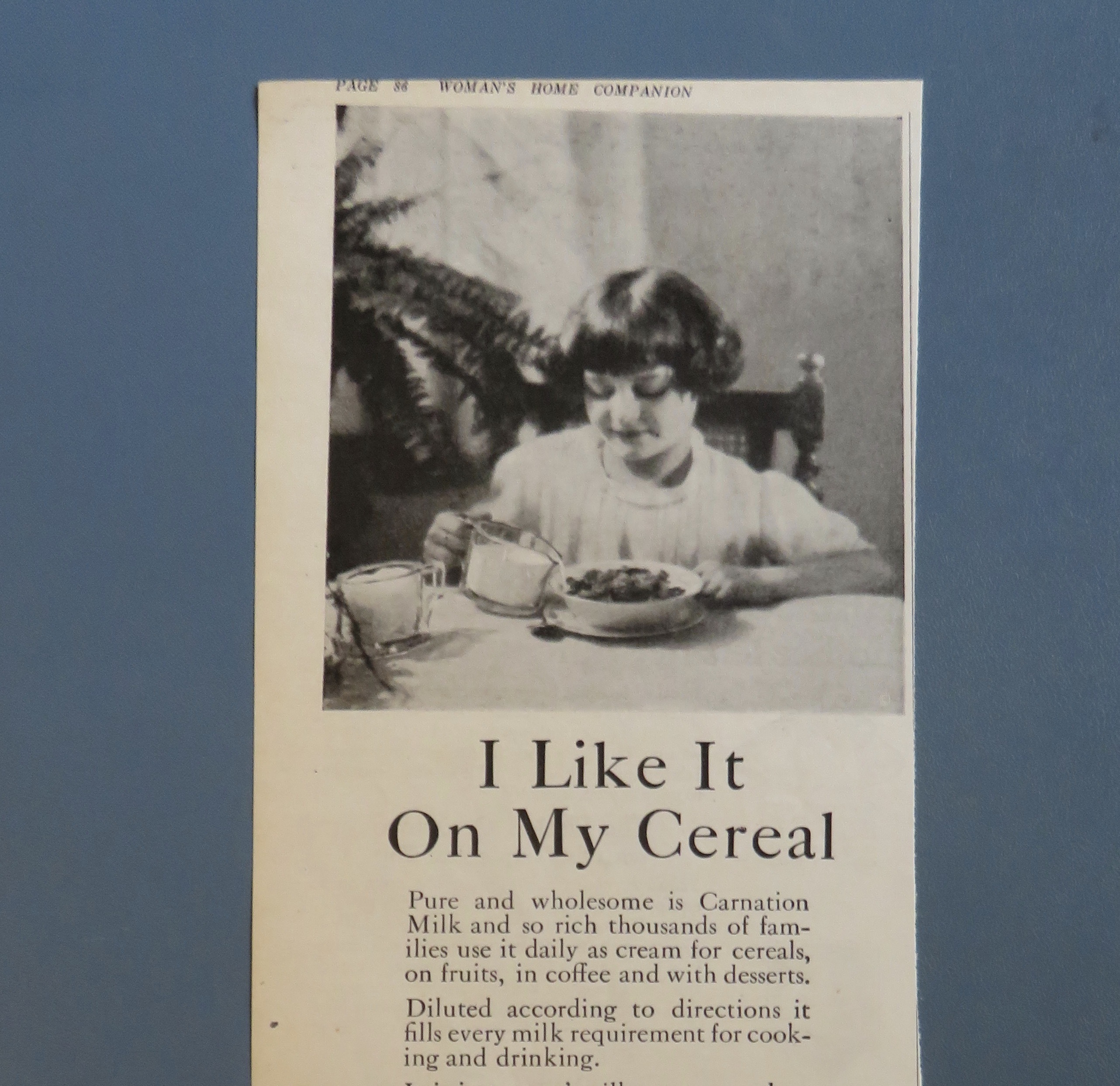 1920 Carnation Milk with Girl Pouring Over Cereal