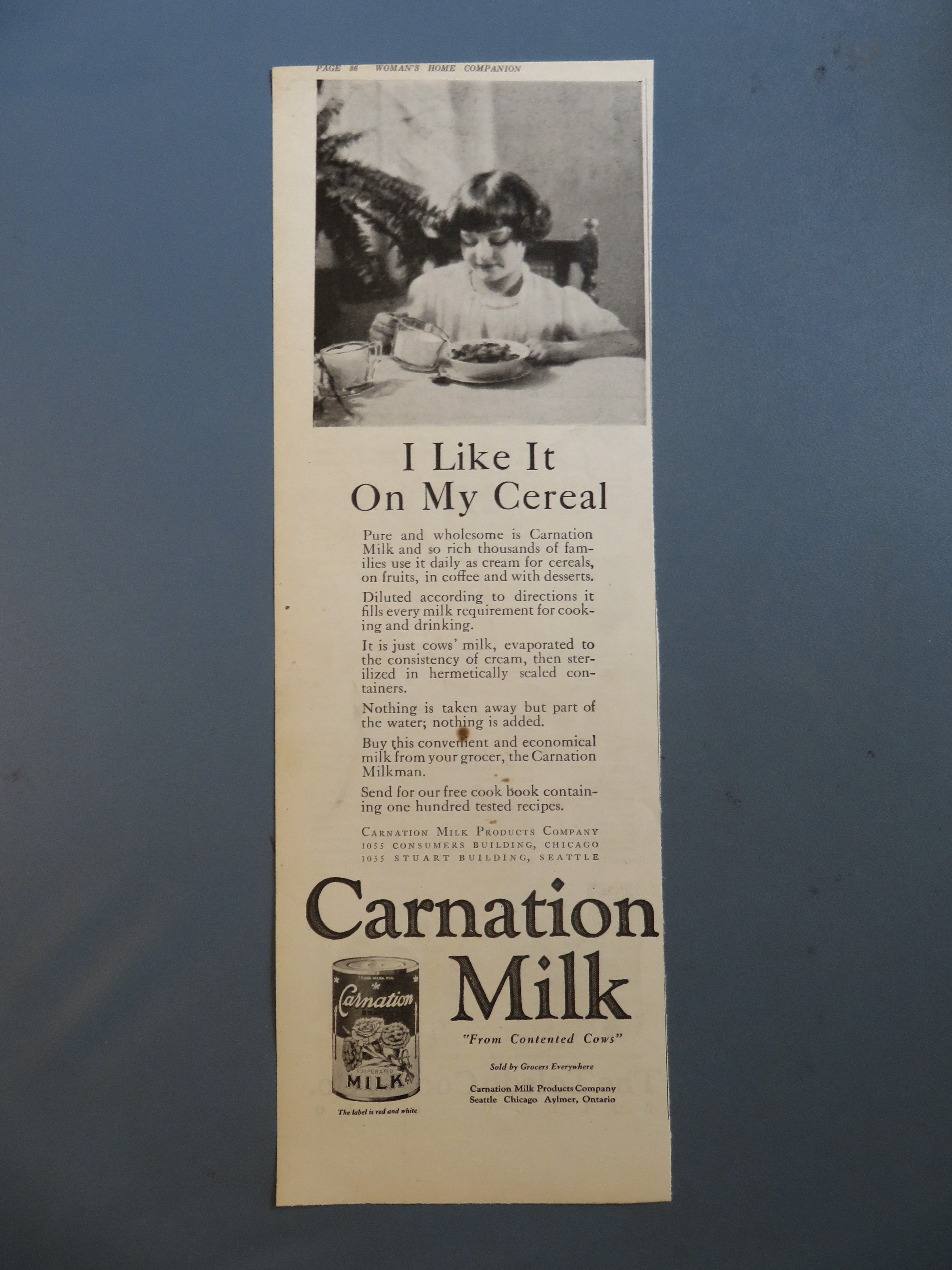 1920 Carnation Milk with Girl Pouring Over Cereal