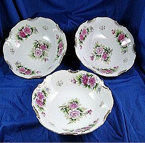 China floral bowls with gold trim and roses