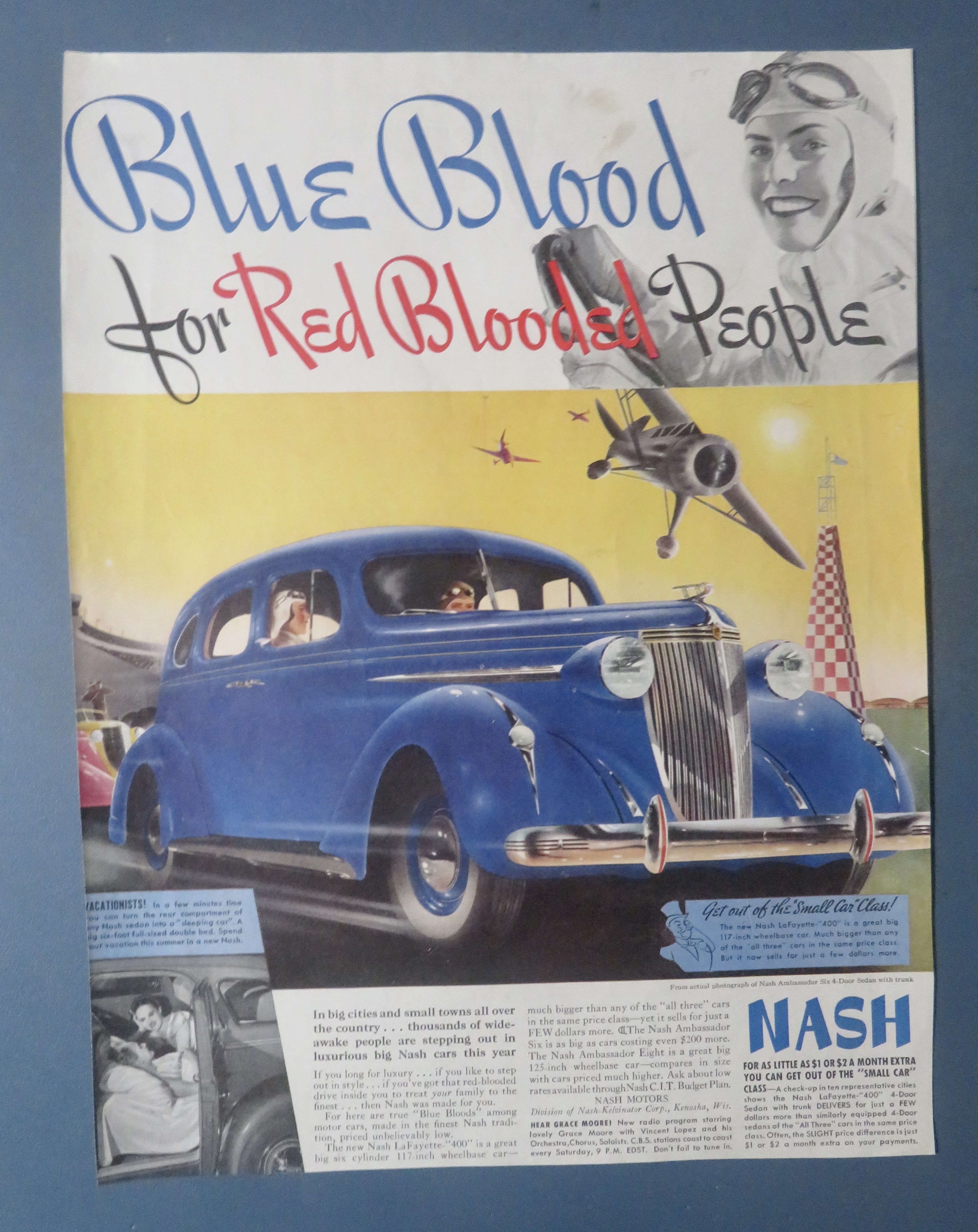 1937 Nash Automobile with Red Blooded People