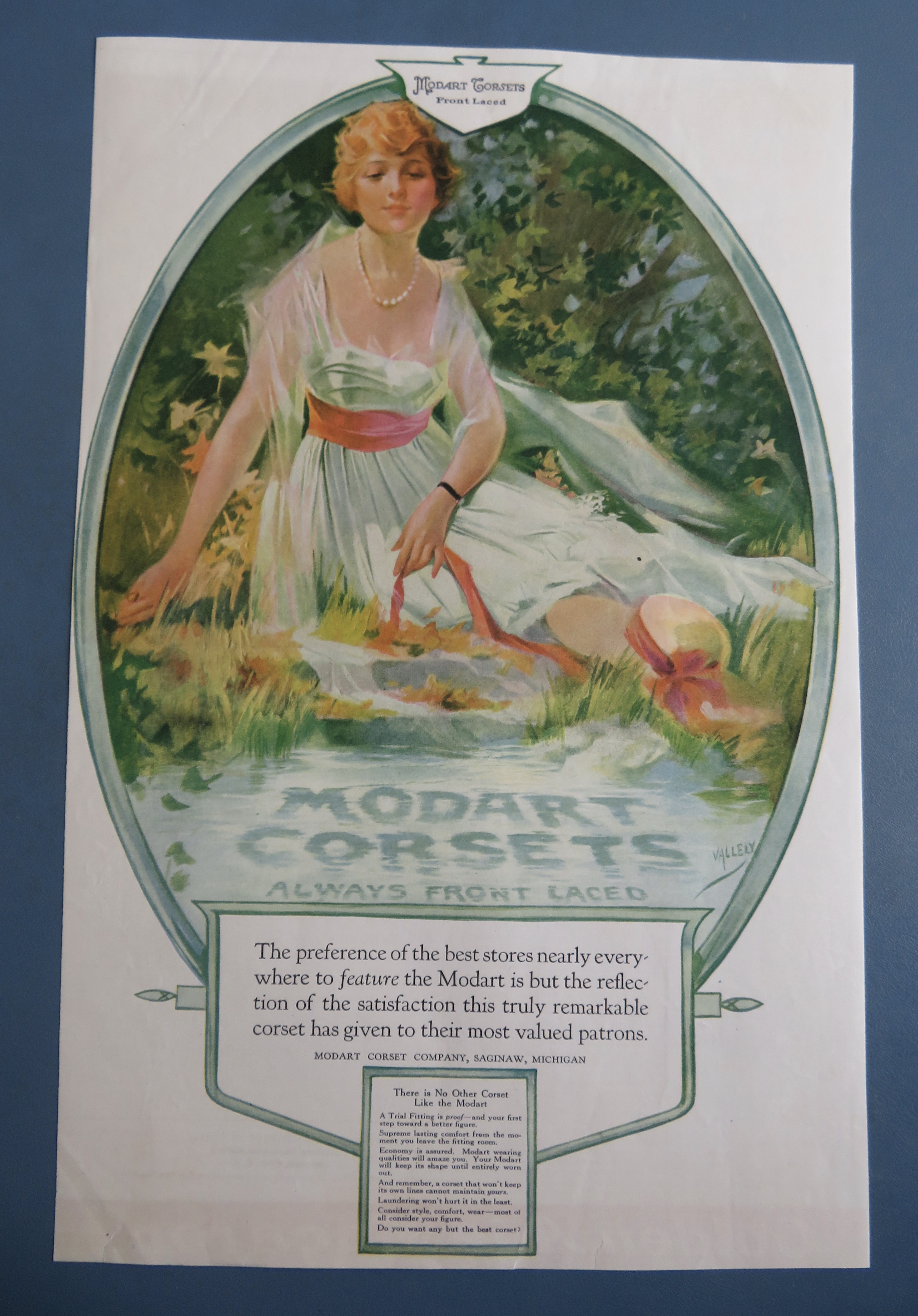 1917 Modart Corsets with Woman Sitting By Water