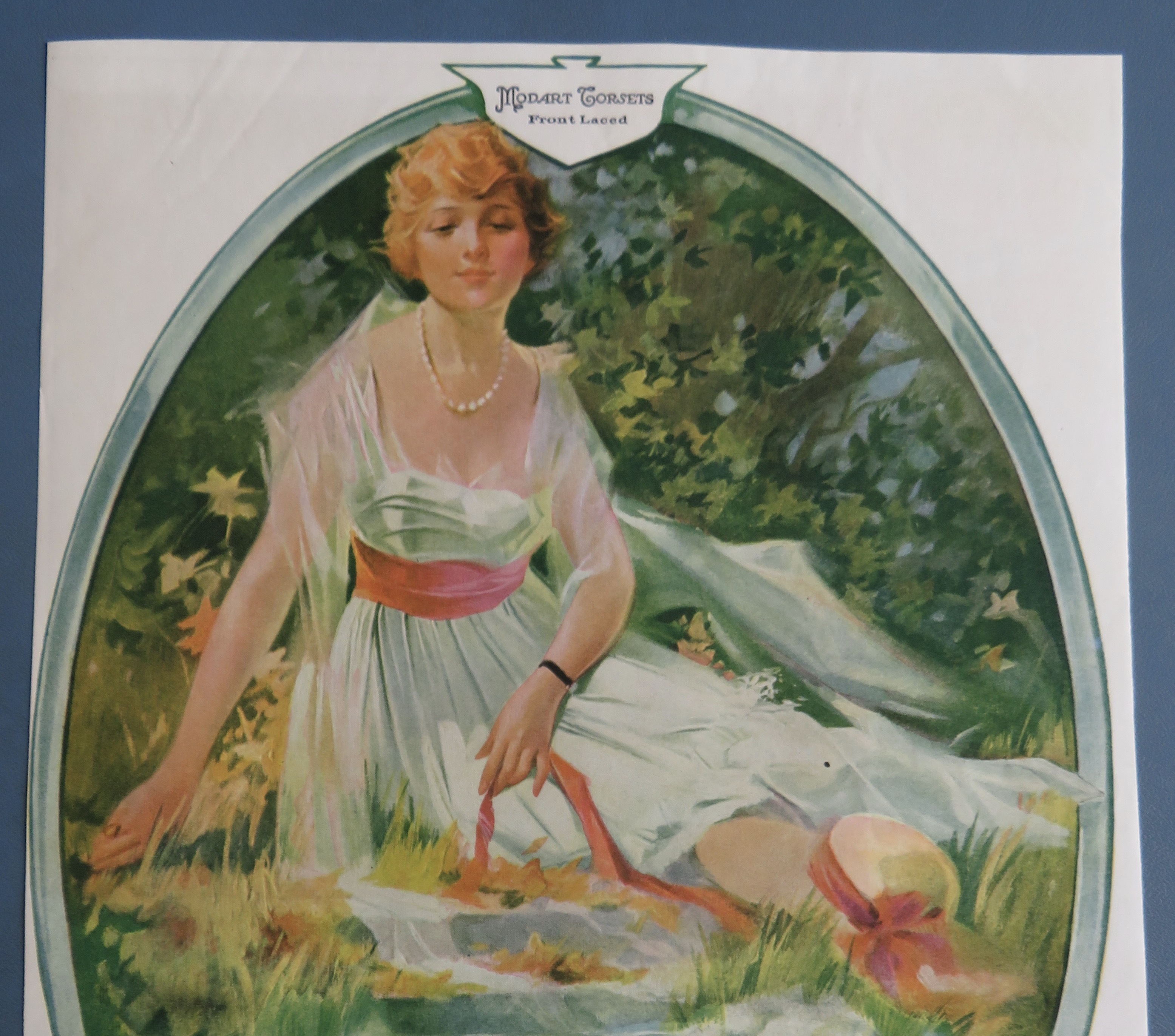 1917 Modart Corsets with Woman Sitting By Water