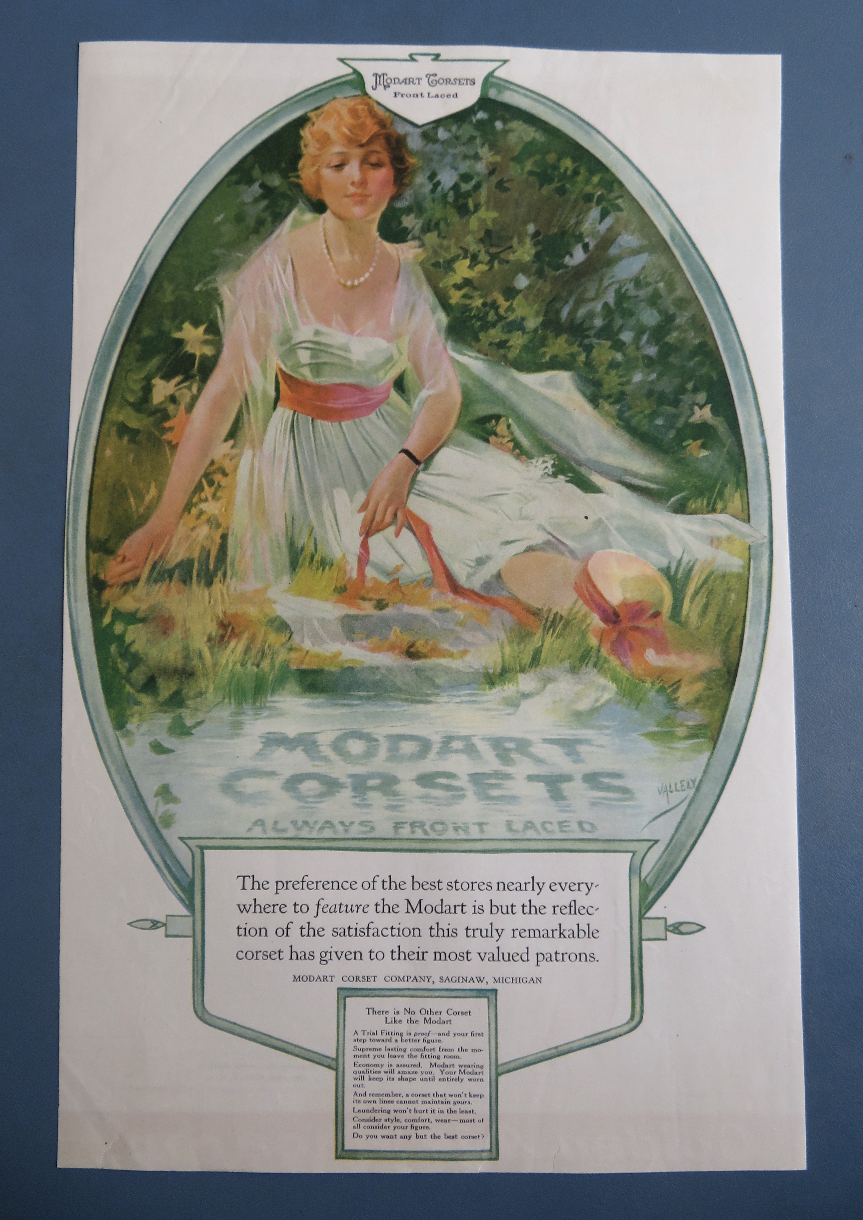 1917 Modart Corsets with Woman Sitting By Water