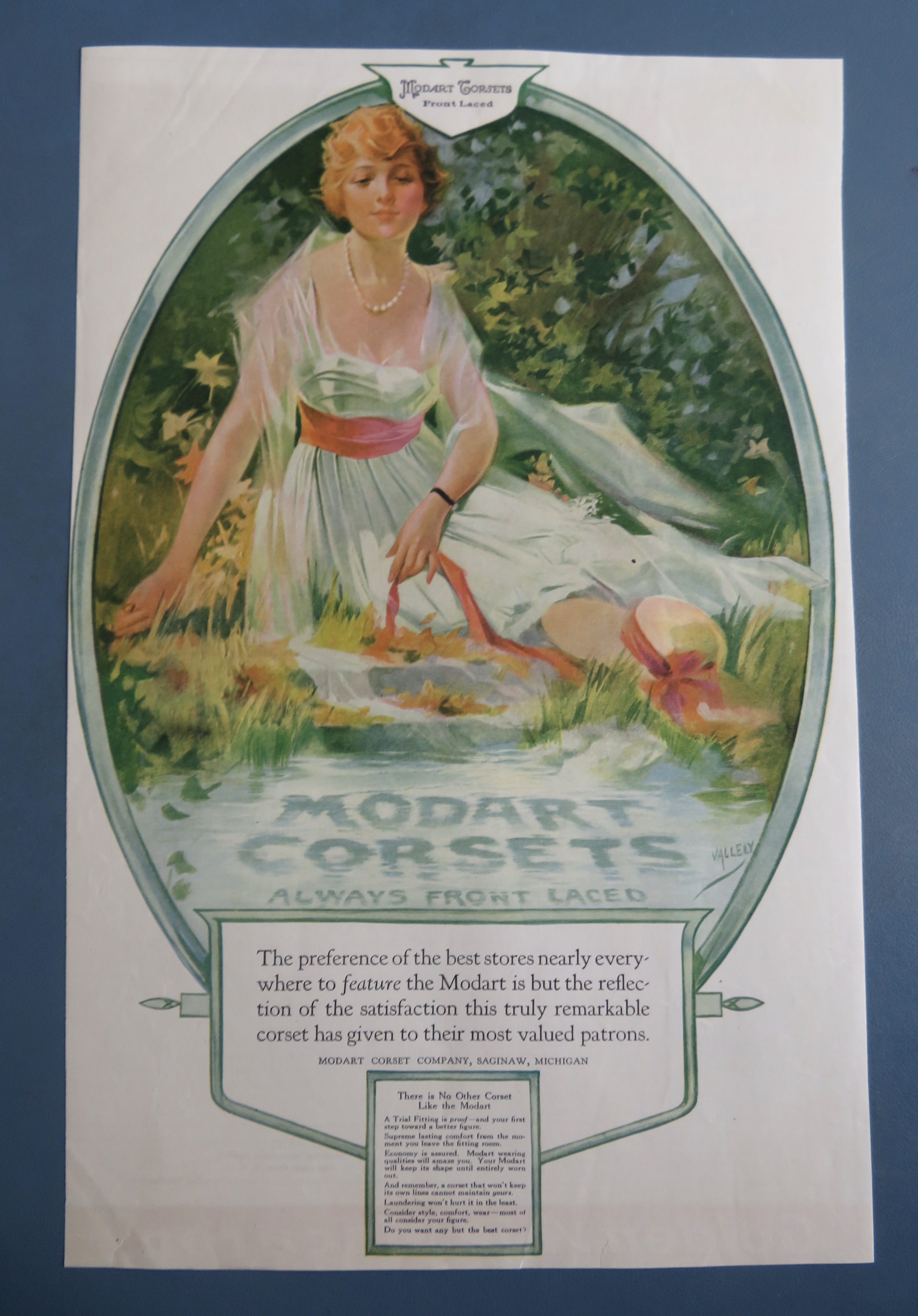 1917 Modart Corsets with Woman Sitting By Water