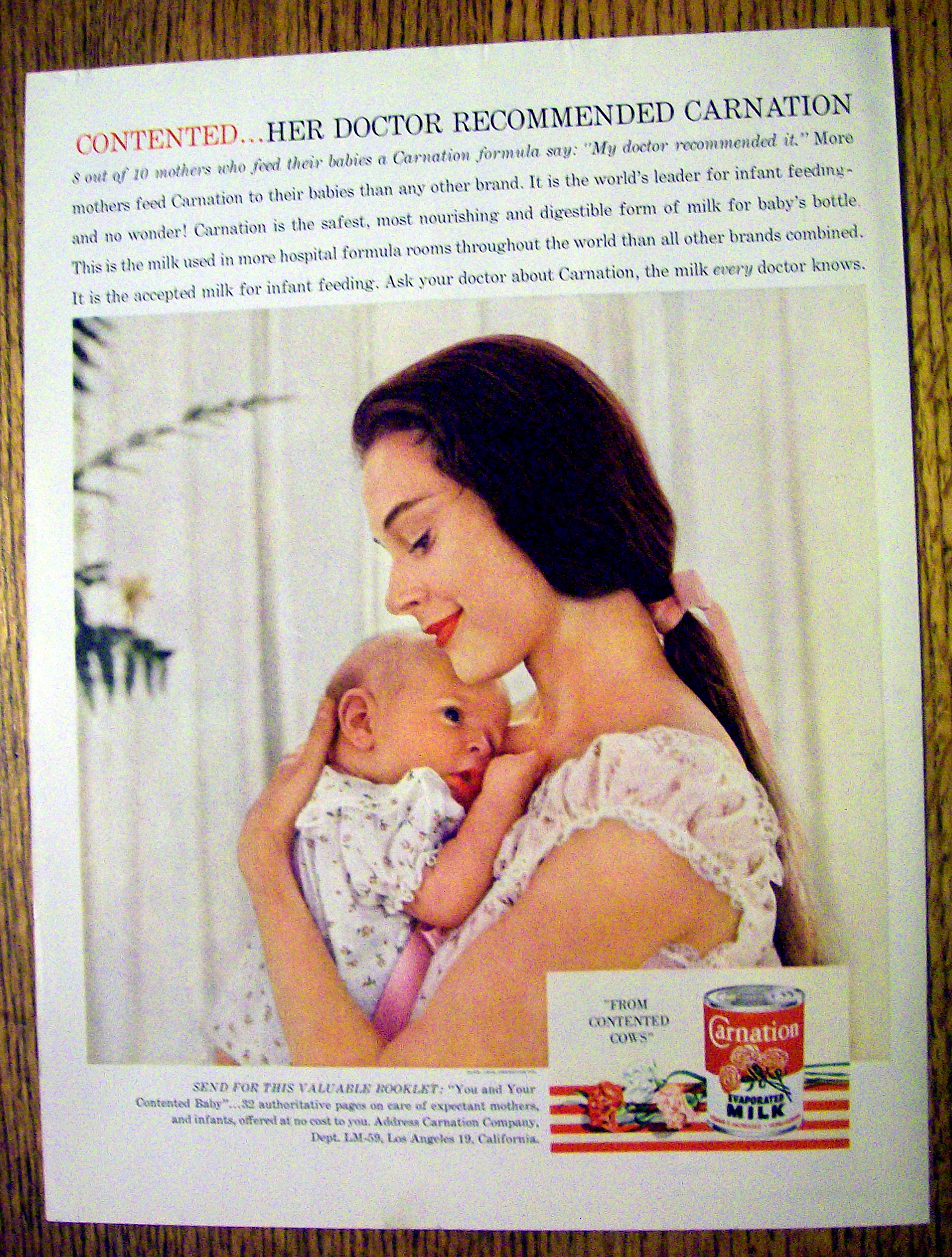 1959 Carnation Milk with Woman Holding Baby