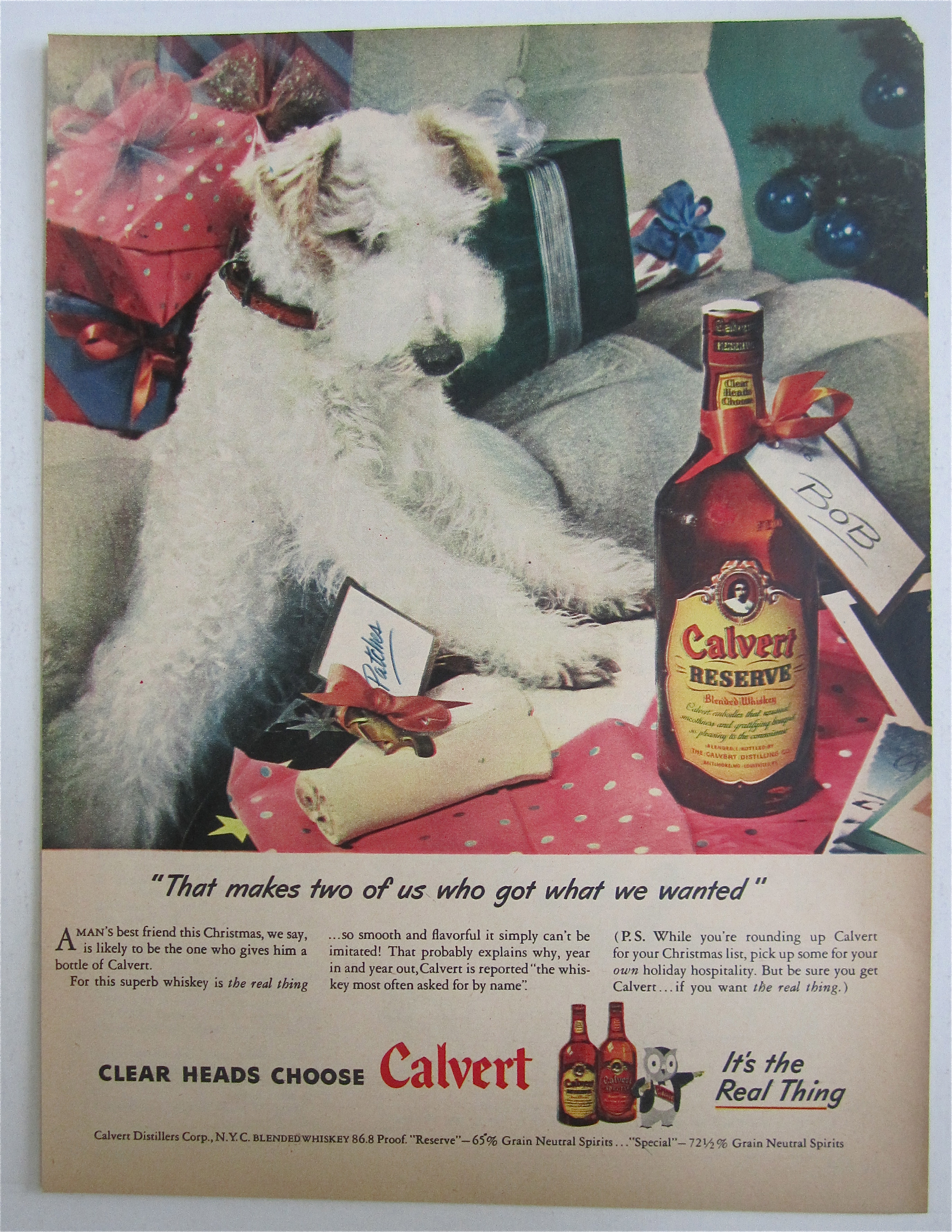 1945 Calvert Whiskey with Puppy Looking At A Bone