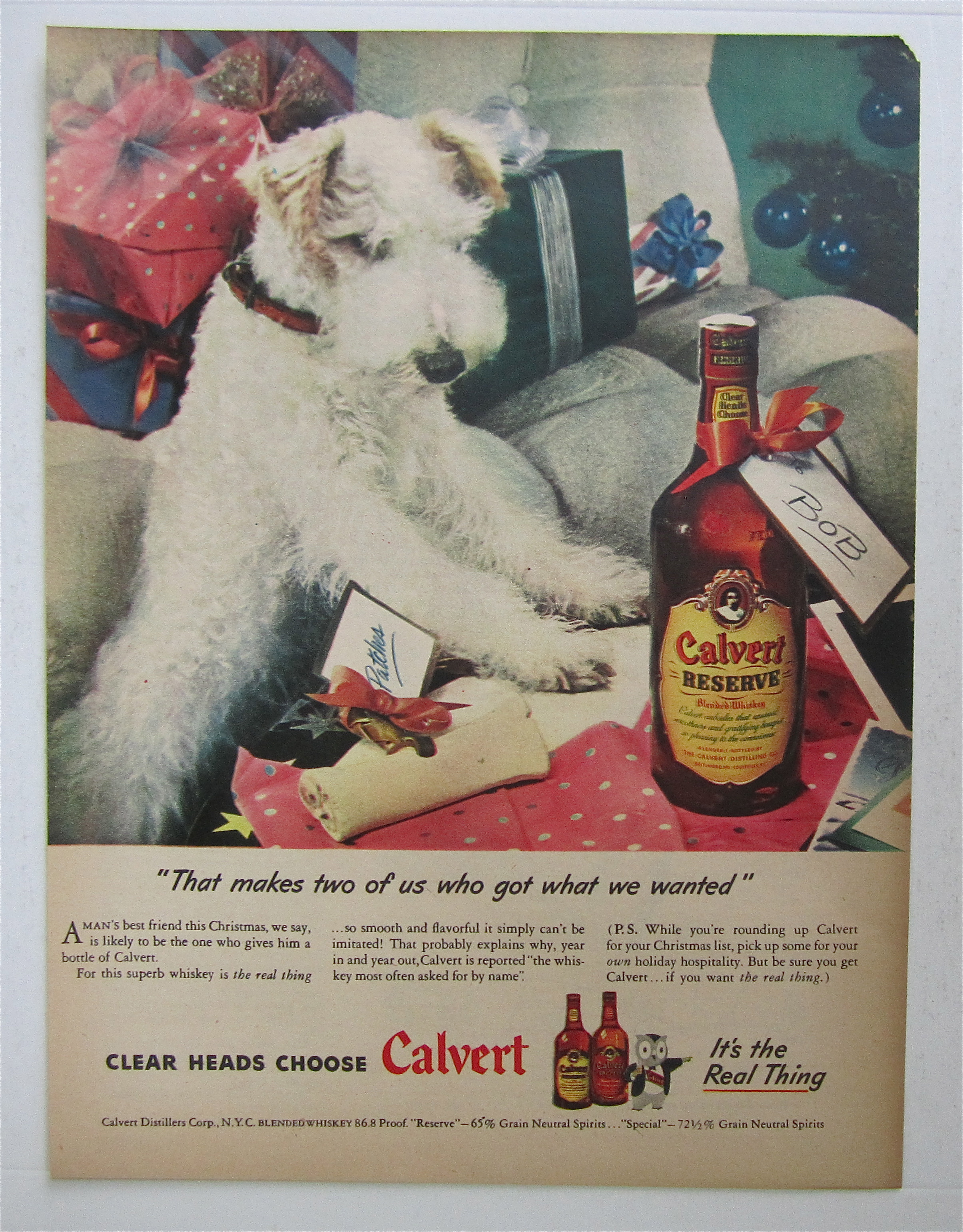 1945 Calvert Whiskey with Puppy Looking At A Bone