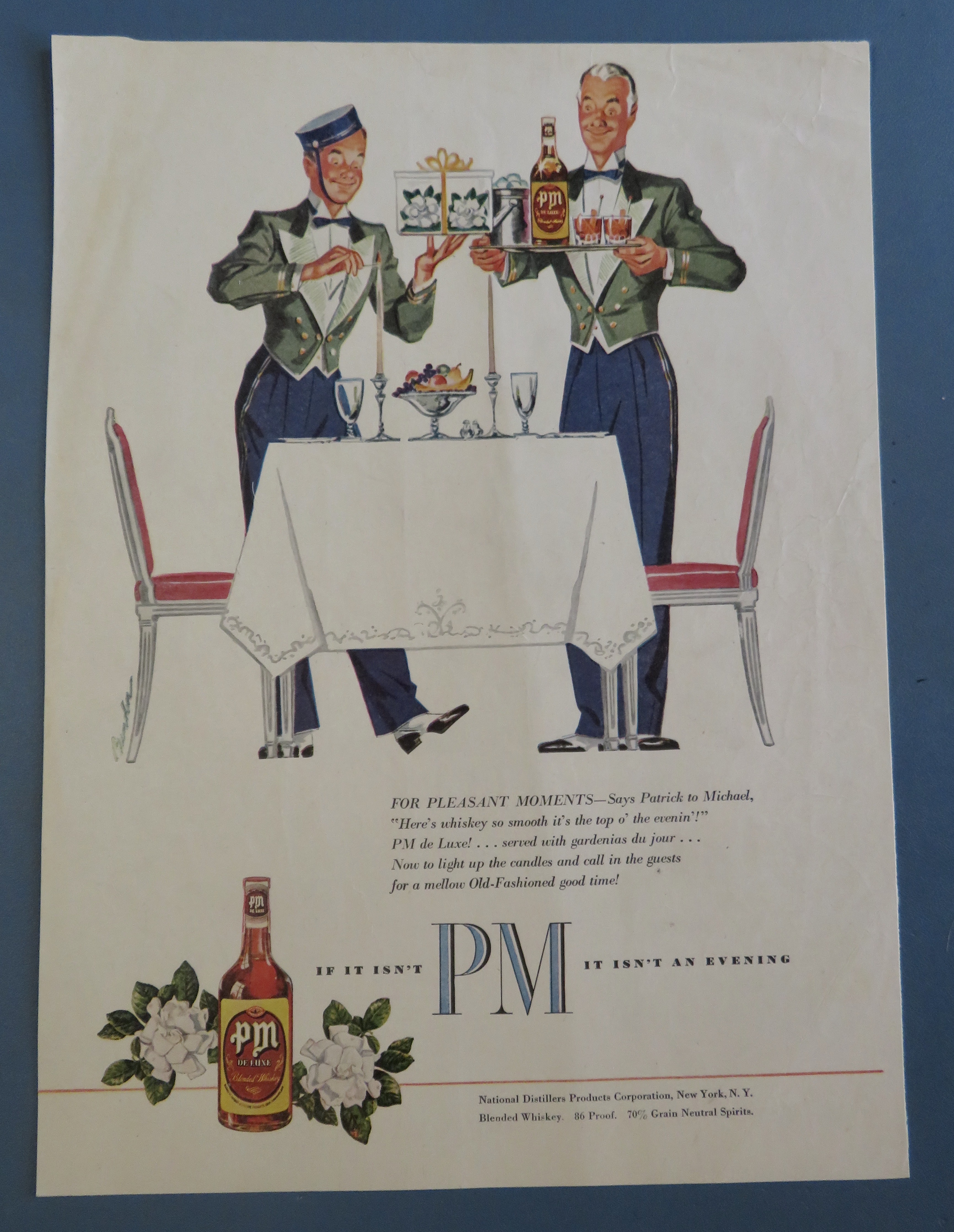 1950's PM Whiskey with 2 Bellboys Setting A Table