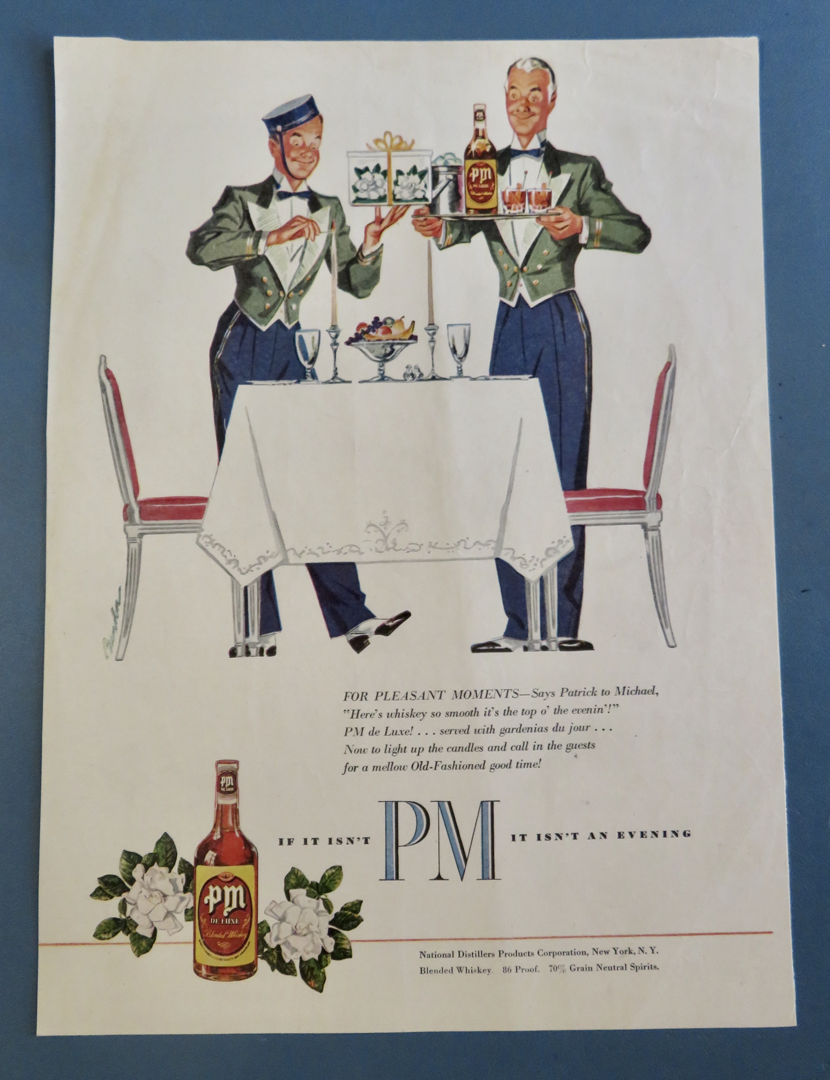 1950's PM Whiskey with 2 Bellboys Setting A Table