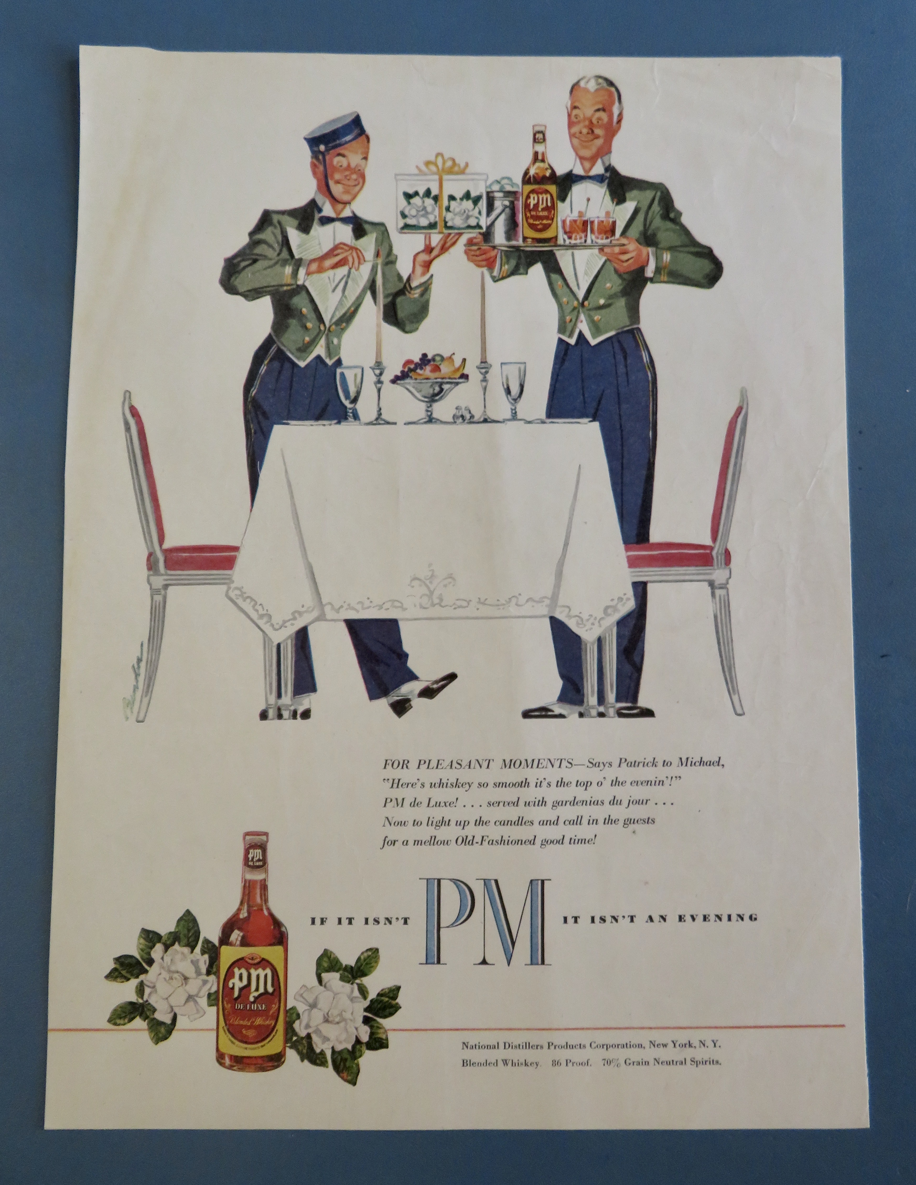 1950's PM Whiskey with 2 Bellboys Setting A Table