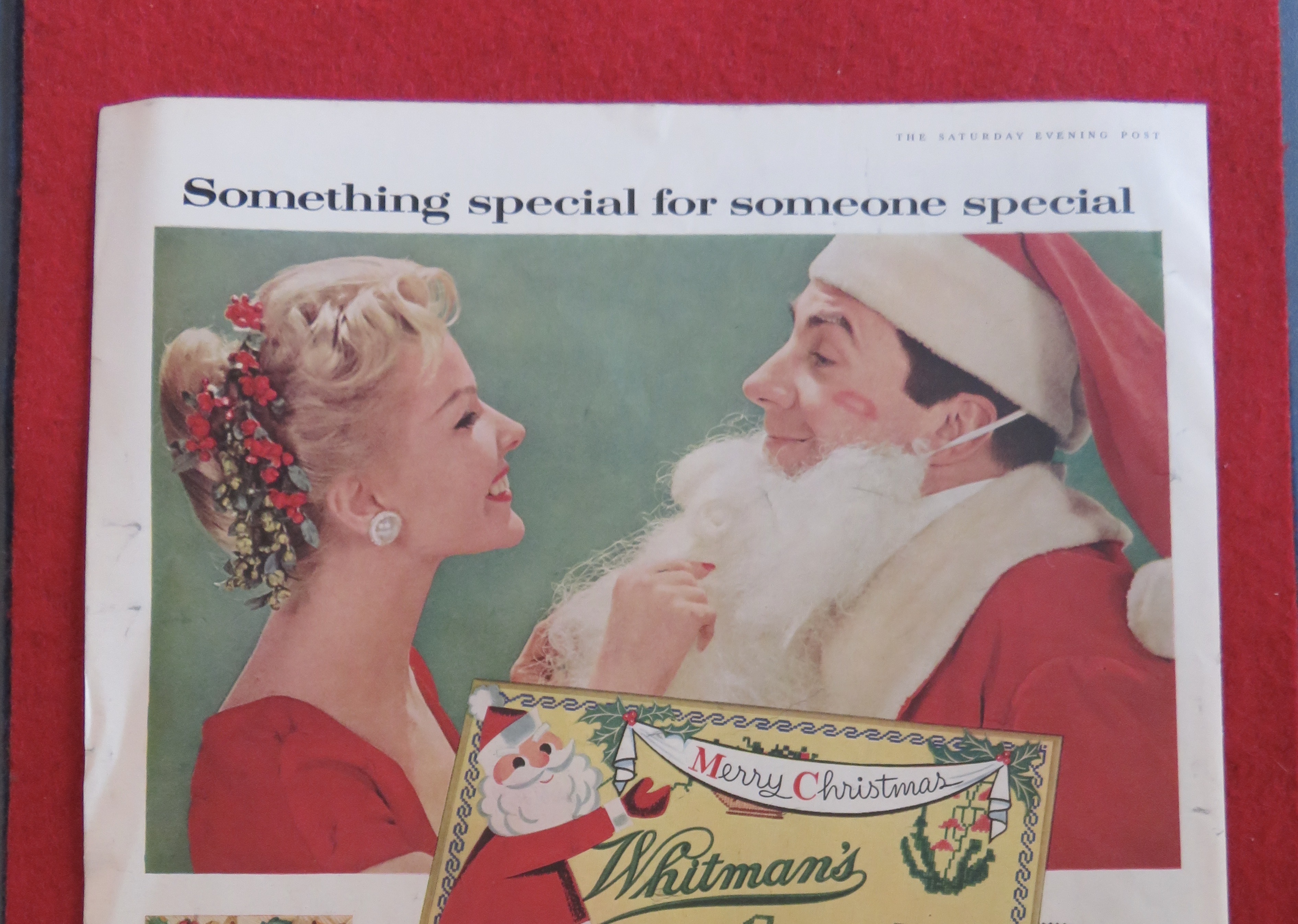 1957 Whitman's Sampler with Woman & Man as Santa